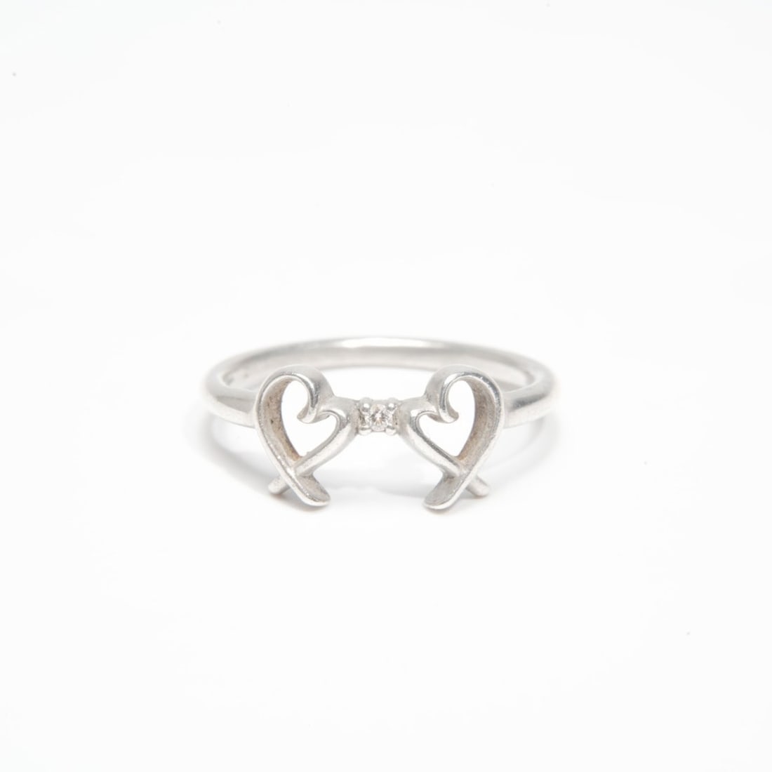 Tiffany & Co. 925 Double Loving Heart Ring, size 50, Silver, WS23995: --- Catalog ---Category: SizeJP Size: 7US Size: 4Category: DesignType: Band ringColor: SilverGender: WomenCategory: GeneralBrand: TiffanyCountry of Origin: USA--- Item List ---Section: ConditionRankin