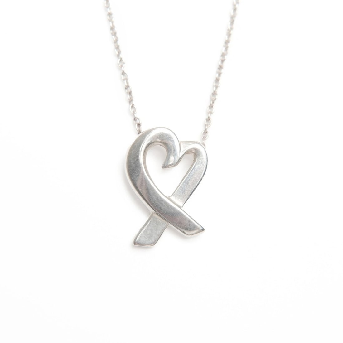 Tiffany & Co. 925 Wrapped Heart Necklace, Silver, WS24002: --- Catalog ---Category: SizePendant Size: 15mm x 10mm / 0.59'' x 0.39''Neck Circumference: 46 cm / 18.11''Category: DesignColor: SilverGender: WomenNecklace Type: NecklaceCategory: GeneralBrand: Tiff
