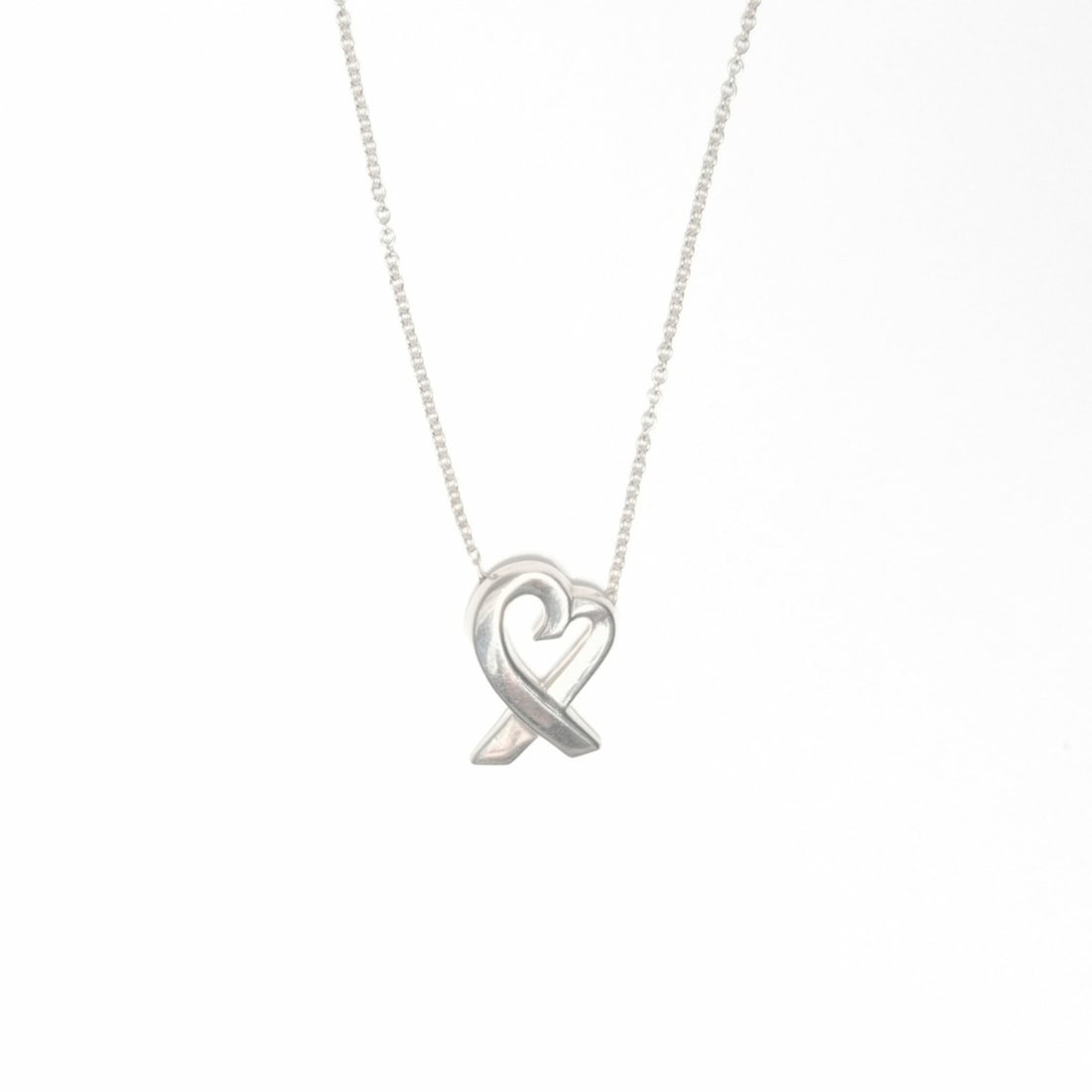 Tiffany & Co. 925 Wrapped Heart Necklace in Silver, WS24011: --- Catalog ---Category: SizePendant Size: 15mm x 10mm / 0.59'' x 0.39''Neck Circumference: 40 cm / 15.74''Category: DesignColor: SilverGender: WomenNecklace Type: NecklaceCategory: GeneralBrand: Tiff
