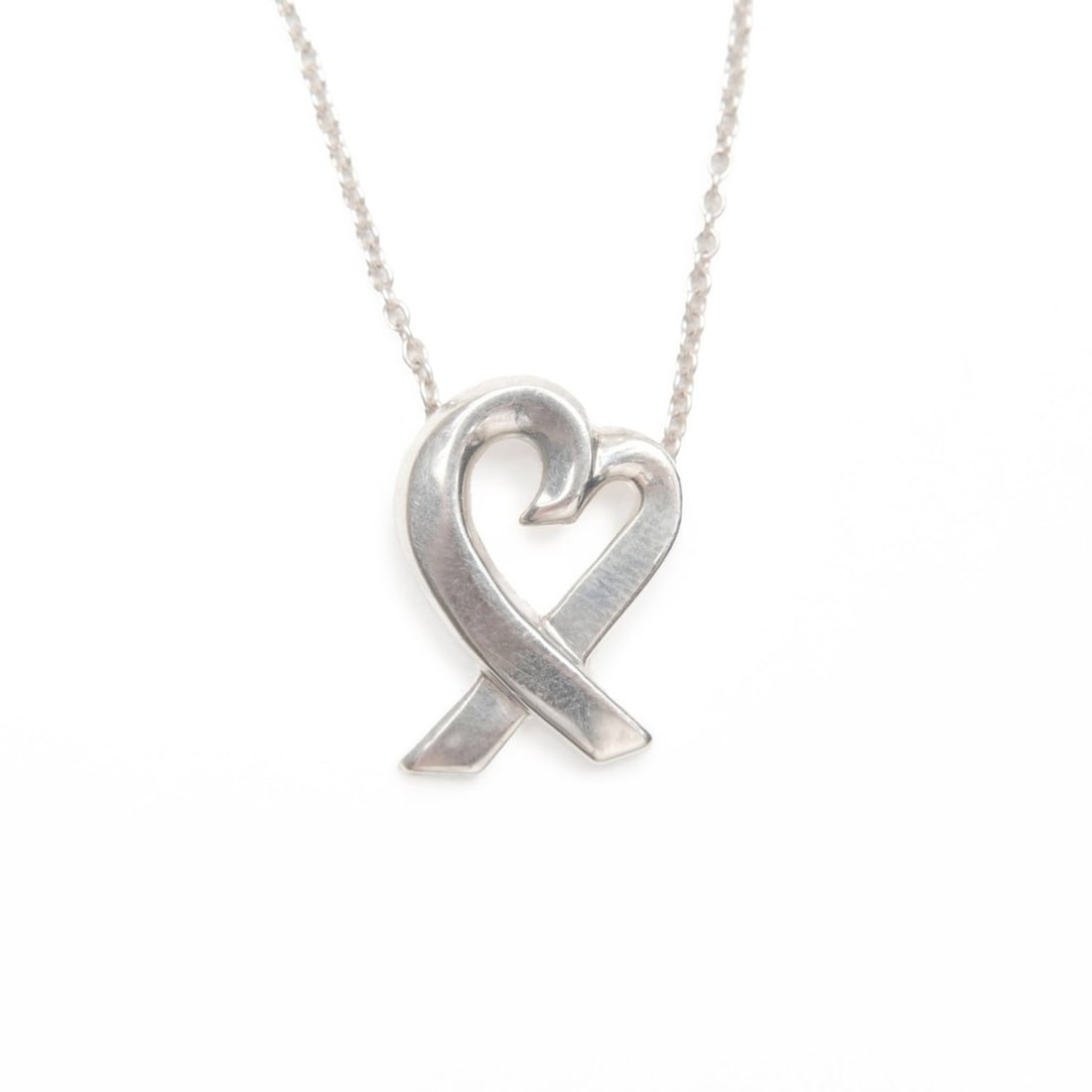 Tiffany & Co. 925 Wrapped Heart Necklace in Silver, WS24029: --- Catalog ---Category: SizePendant Size: 15mm x 10mm / 0.59'' x 0.39''Neck Circumference: 40 cm / 15.74''Category: DesignColor: SilverGender: WomenNecklace Type: NecklaceCategory: GeneralBrand: Tiff
