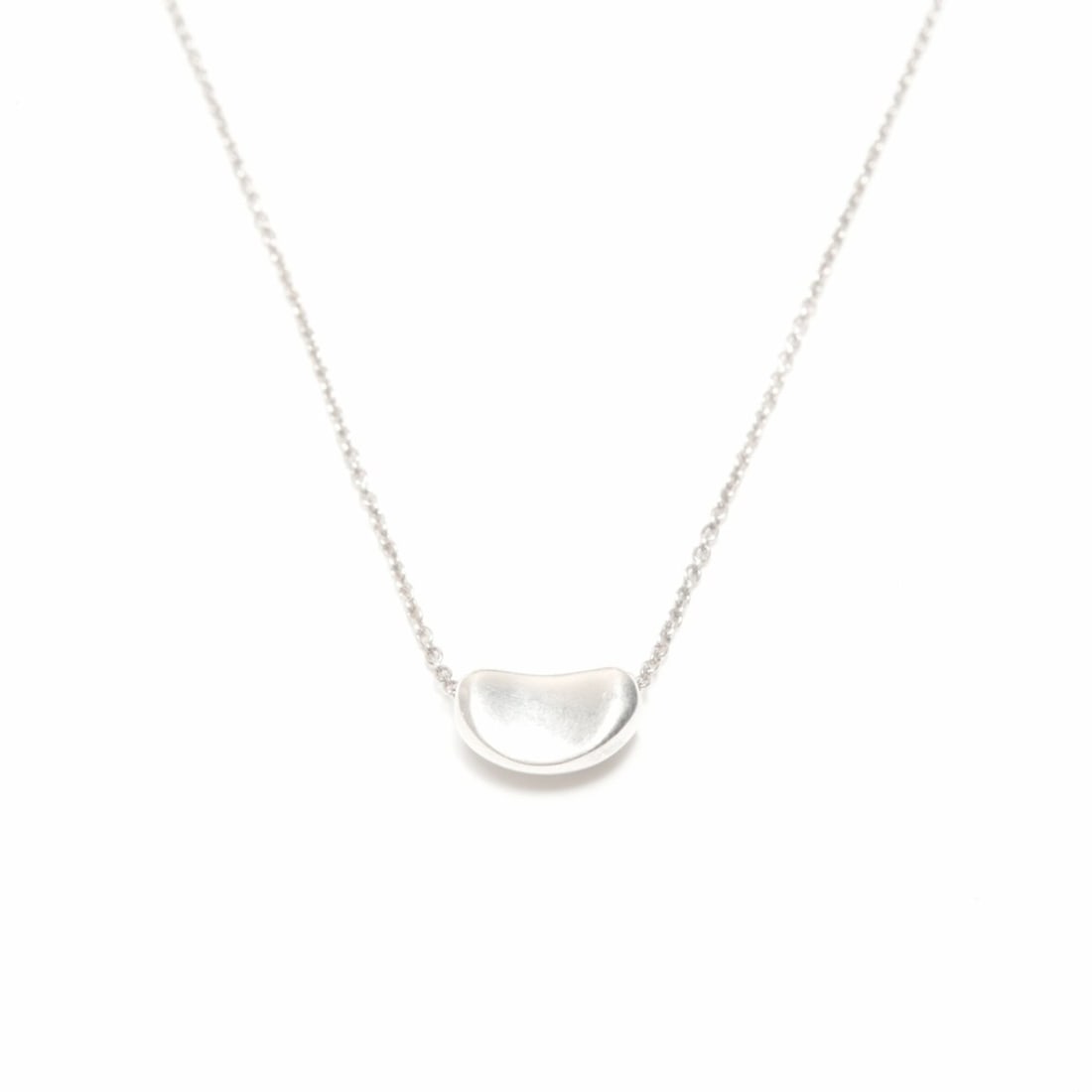 Tiffany & Co. Beans 925 Sterling Silver Necklace WS24327: --- Catalog ---Category: SizePendant Size: 5mm x 10mm / 0.19'' x 0.39''Neck Circumference: 40 cm / 15.74''Category: DesignColor: SilverGender: WomenNecklace Type: NecklaceCategory: GeneralBrand: Tiffa