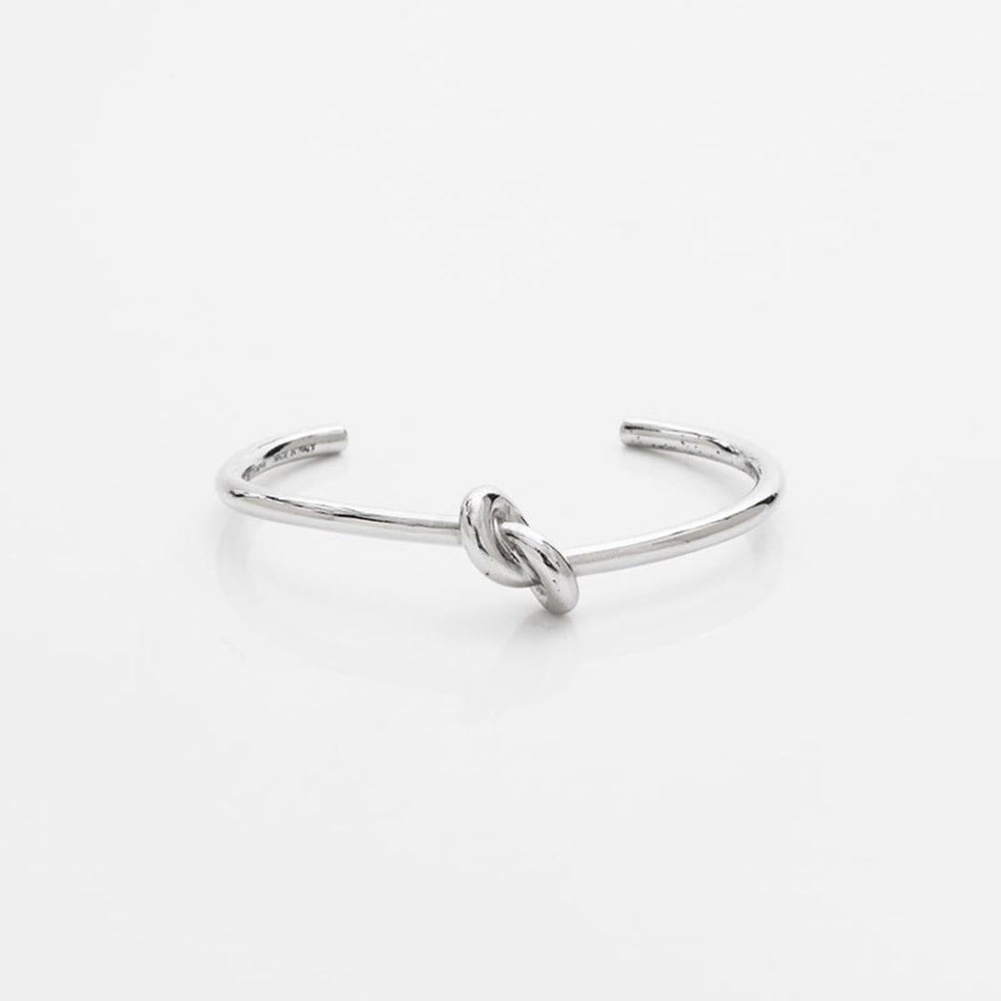 Celine Knot Bangle Bracelet, Silver, WS22928: --- Catalog ---Category: SizeLength: 13cm / 5.11''Category: DesignType: BangleColor: SilverGender: WomenCategory: GeneralBrand: CelineCountry of Origin: Italy--- Item List ---Section: ConditionRanking