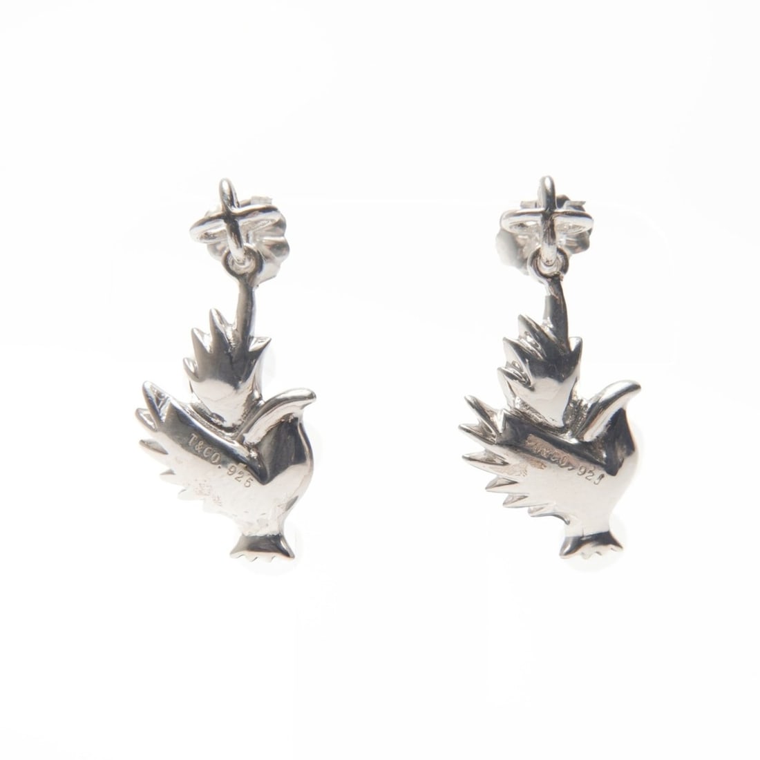 Tiffany & Co. 925 Bird Earrings in Silver WS24008: --- Catalog ---Category: SizeSize (HxWxD): 23.00mm x 8.00mm / 0.91'' x 0.31''Category: DesignType: Drop earringsColor: SilverGender: WomenMaterial: Silver 925Category: GeneralBrand: Tiffany--- Item Li