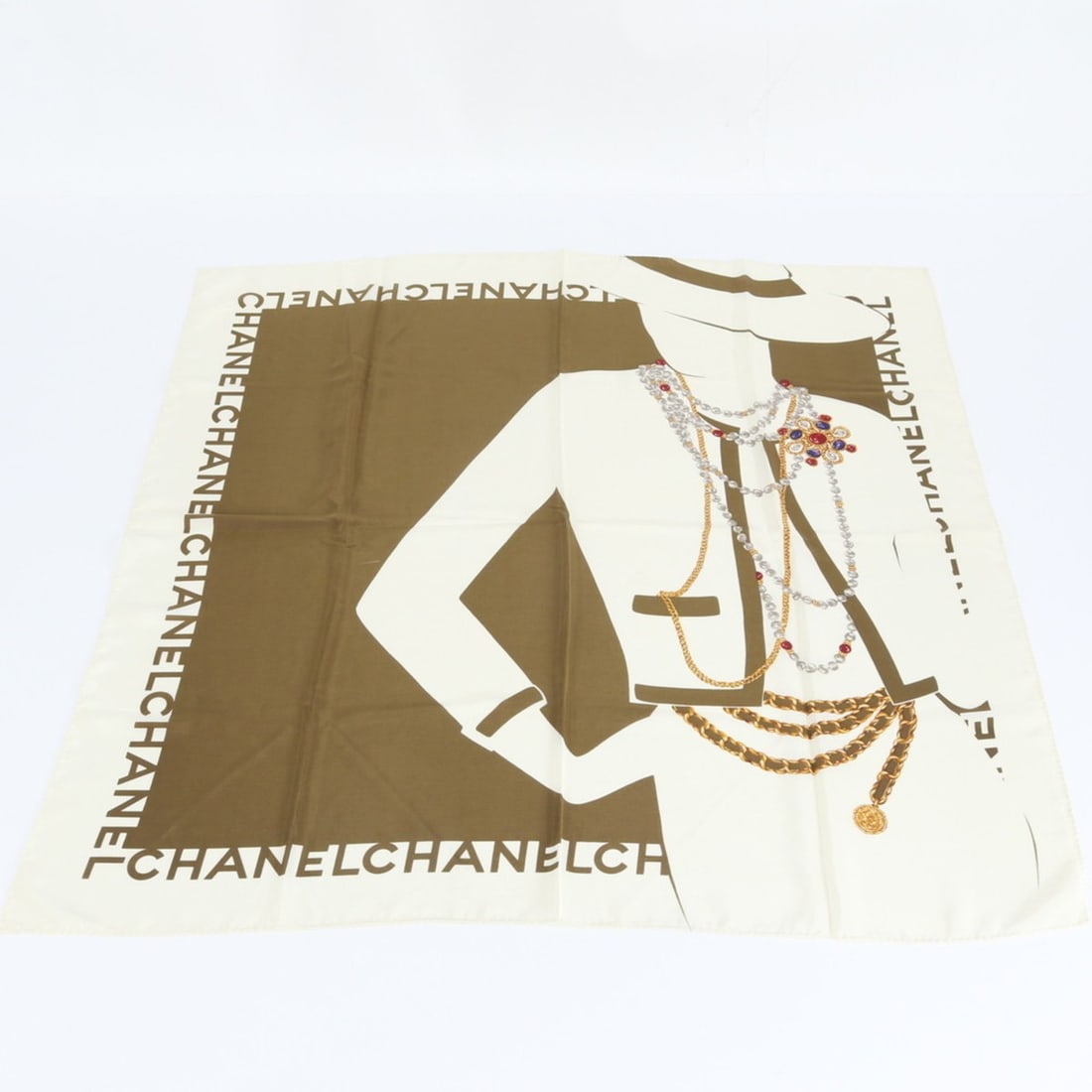Chanel Mademoiselle Off-White Brown Scarf/Muffler Brand Women's: --- Catalog ---Category: SizeSize (LxW): 83cm x 83cm / 32.67'' x 32.67''Category: DesignType: ScarfColor: Brown, Off-whiteGender: WomenCategory: GeneralBrand: Chanel--- Item List ---Section: Condition