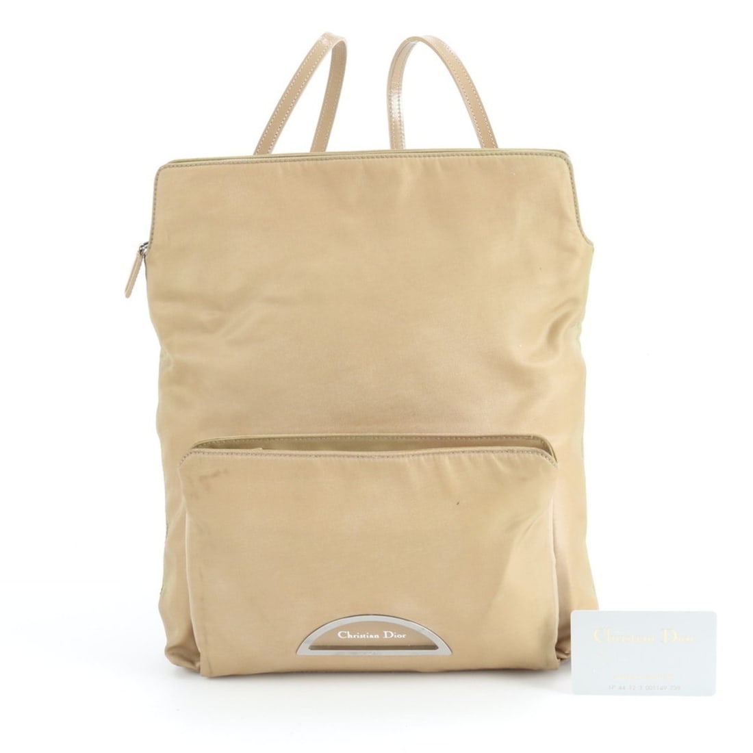 Christian Dior Beige Leather and Nylon Backpack Bag for Women with Guarantee Card: --- Catalog ---Category: SizeSize (HxWxD): 31cm x 26cm x 8cm / 12.2'' x 10.23'' x 3.14''Category: DesignType: BackpackColor: BeigeGender: WomenMaterial: Leather , Nylon Category: GeneralBrand: Christi