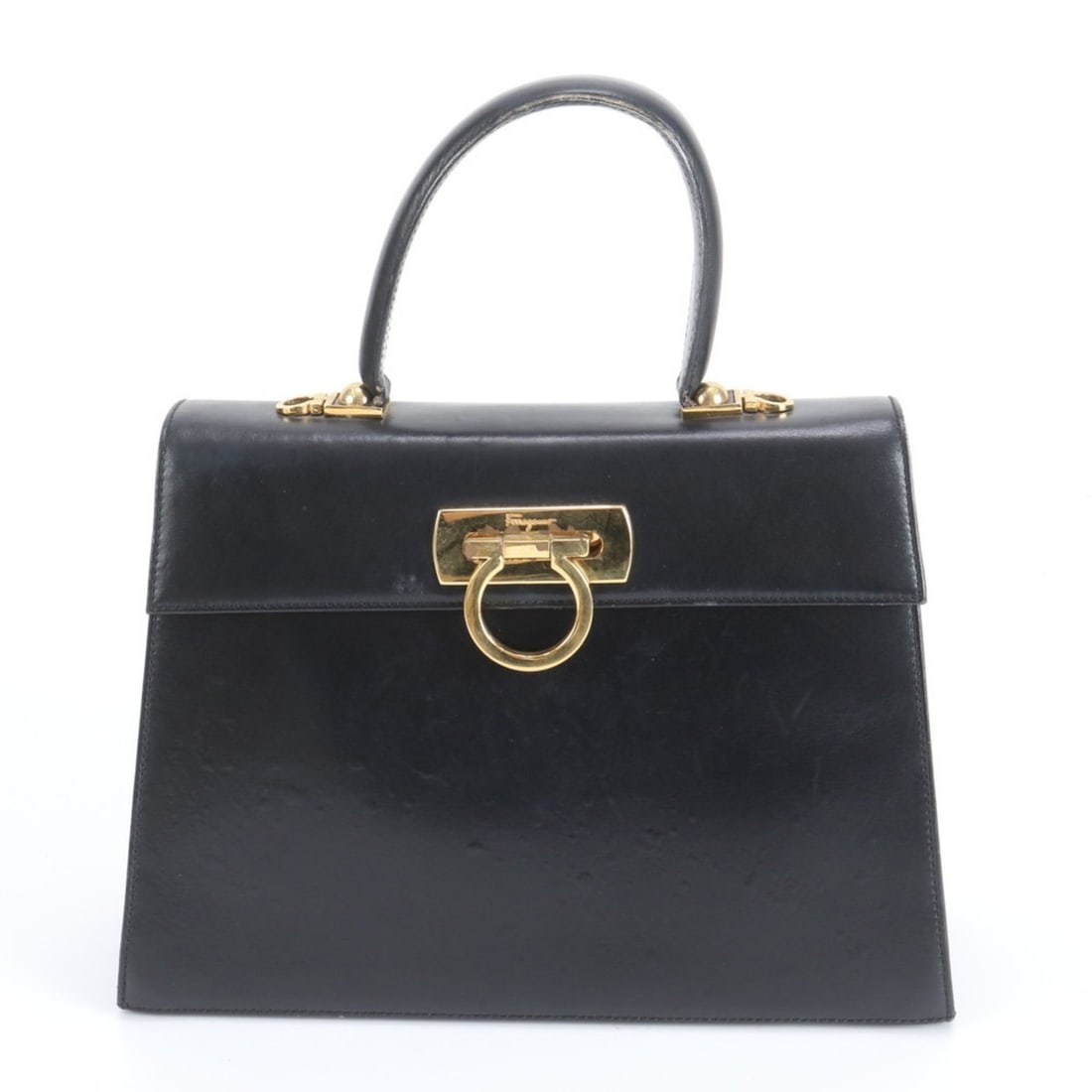 Salvatore Ferragamo Gancini Leather Handbag in Black for Women: --- Catalog ---Category: SizeSize (HxWxD): 20cm x 28cm x 10cm / 7.87'' x 11.02'' x 3.93''Category: DesignType: HandbagColor: BlackGender: WomenMaterial: Leather Category: GeneralBrand: Salvatore Ferra