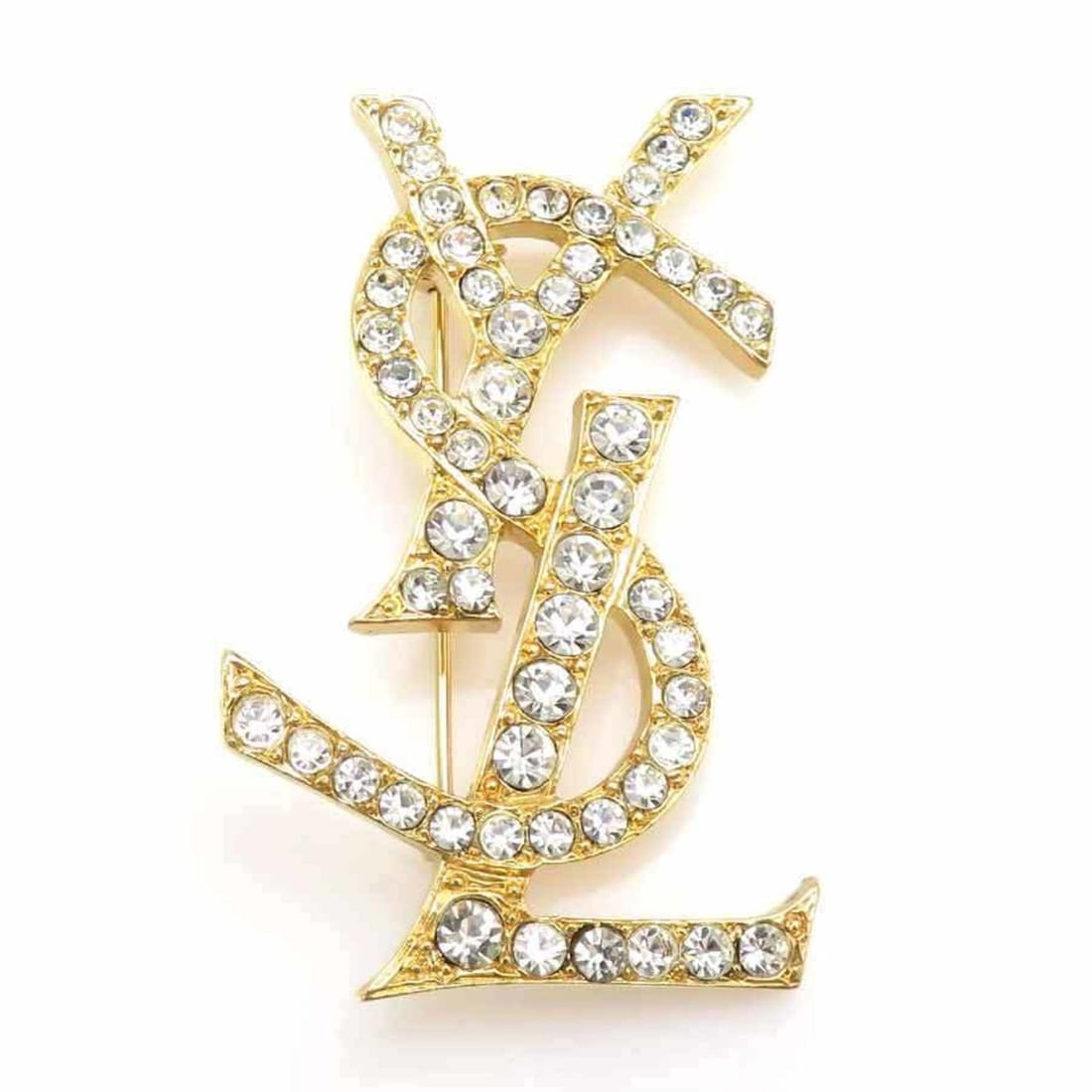 Yves Saint Laurent YSL logo metal brooch with rhinestones in gold and silver. Free shipping. e61530i: --- Catalog ---Category: SizeSize (HxWxD): 5.5cm x 3.5cm / 2.16'' x 1.37''Category: DesignType: BroochColor: Gold, SilverGender: WomenMaterial: Metal, RhinestoneCategory: GeneralBrand: Yves Saint Laur