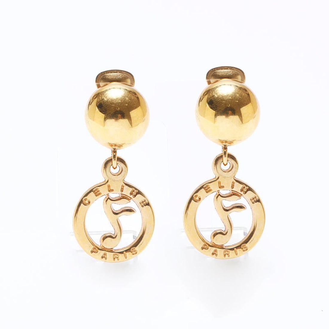 Celine Musical Note Round Earrings, Gold, WS10793: --- Catalog ---Category: SizeSize (HxWxD): 45.00mm x 23.00mm / 1.77'' x 0.91''Category: DesignType: Clip earringsColor: GoldGender: WomenCategory: GeneralBrand: CelineCountry of Origin: Italy--- Item