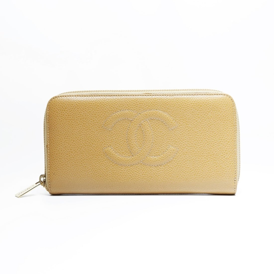 CHANEL Caviar Coco Mark Round Zip Long Wallet, Beige, WS23509: --- Catalog ---Category: SizeSize (HxWxD): 10cm x 19cm x 1.7cm / 3.93'' x 7.48'' x 0.66''Category: DesignType: Long wallet (bi-fold)Color: BeigeGender: WomenCategory: GeneralBrand: ChanelCountry of Or