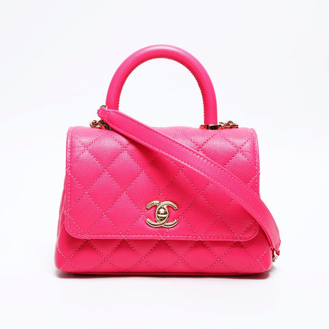 CHANEL Coco Handle XS Mini Caviar 2-Way Matelasse Shoulder Bag, Pink, WS22031: --- Catalog ---Category: SizeHandle Drop: 6.50cm / 2.56''Size (HxWxD): 12cm x 19cm x 8cm / 4.72'' x 7.48'' x 3.14''Strap Length: 120cm / 47.24''Category: DesignType: Shoulder bagColor: PinkGender: Wom