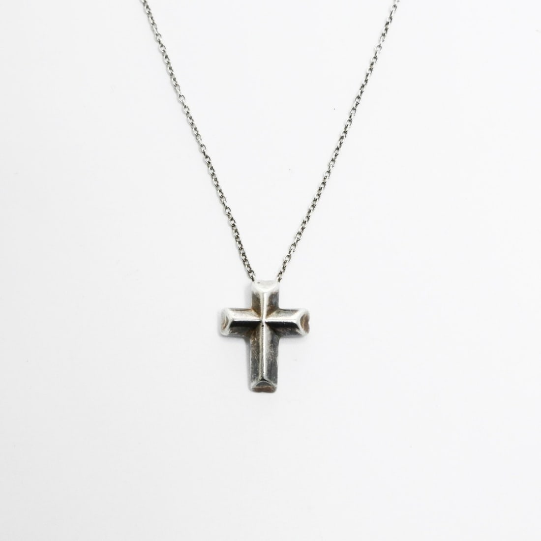 Tiffany & Co. Cross Necklace, Silver, WS25773: --- Catalog ---Category: SizePendant Size: 15mm x 12mm / 0.59'' x 0.47''Category: DesignColor: SilverGender: WomenNecklace Type: NecklaceCategory: GeneralBrand: TiffanyCountry of Origin: USA--- Item L