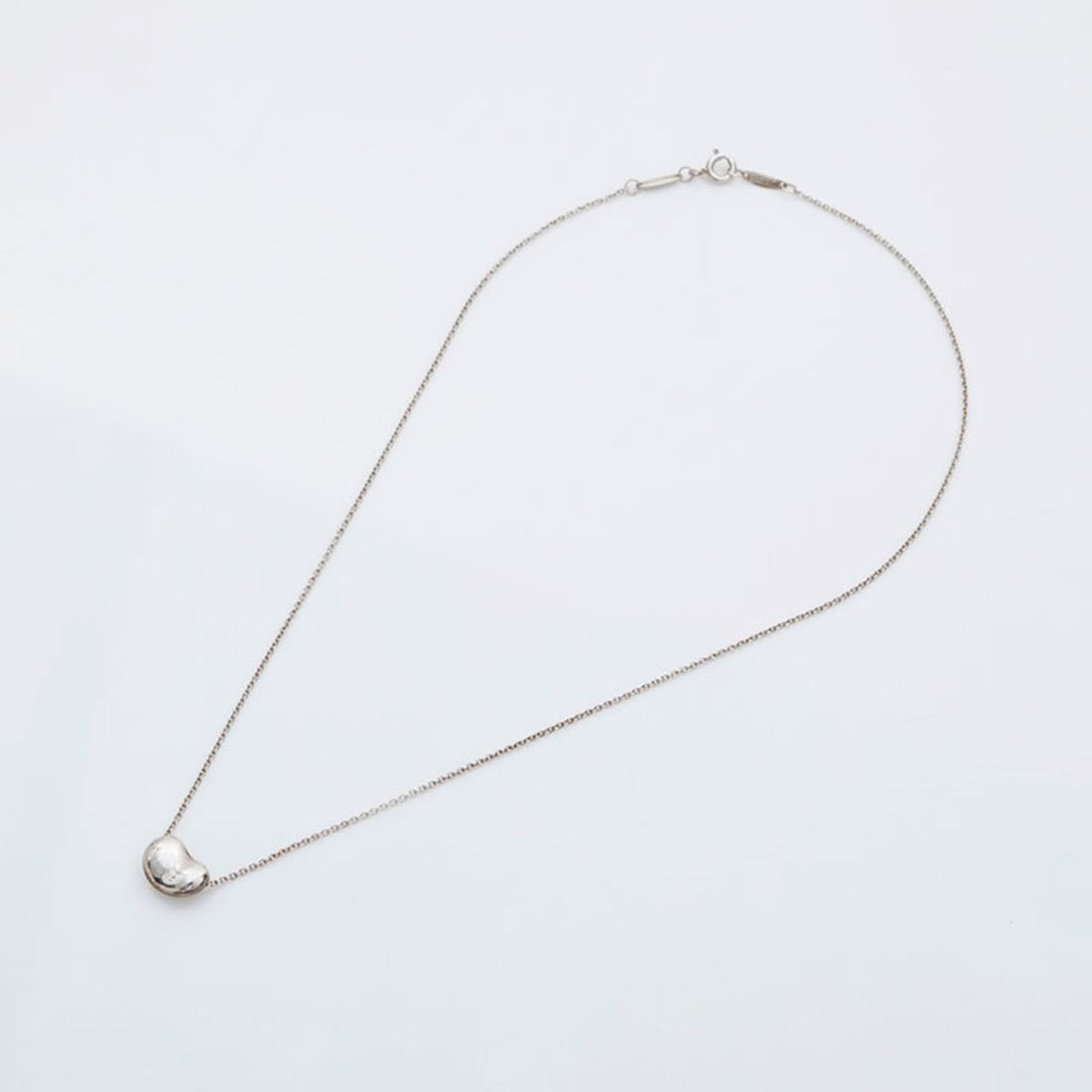 Tiffany & Co. 925 Bean Necklace in Silver, WS23030: --- Catalog ---Category: SizePendant Size: 6mm x 10mm / 0.23'' x 0.39''Neck Circumference: 40 cm / 15.74''Category: DesignColor: SilverGender: WomenNecklace Type: NecklaceCategory: GeneralBrand: Tiffa