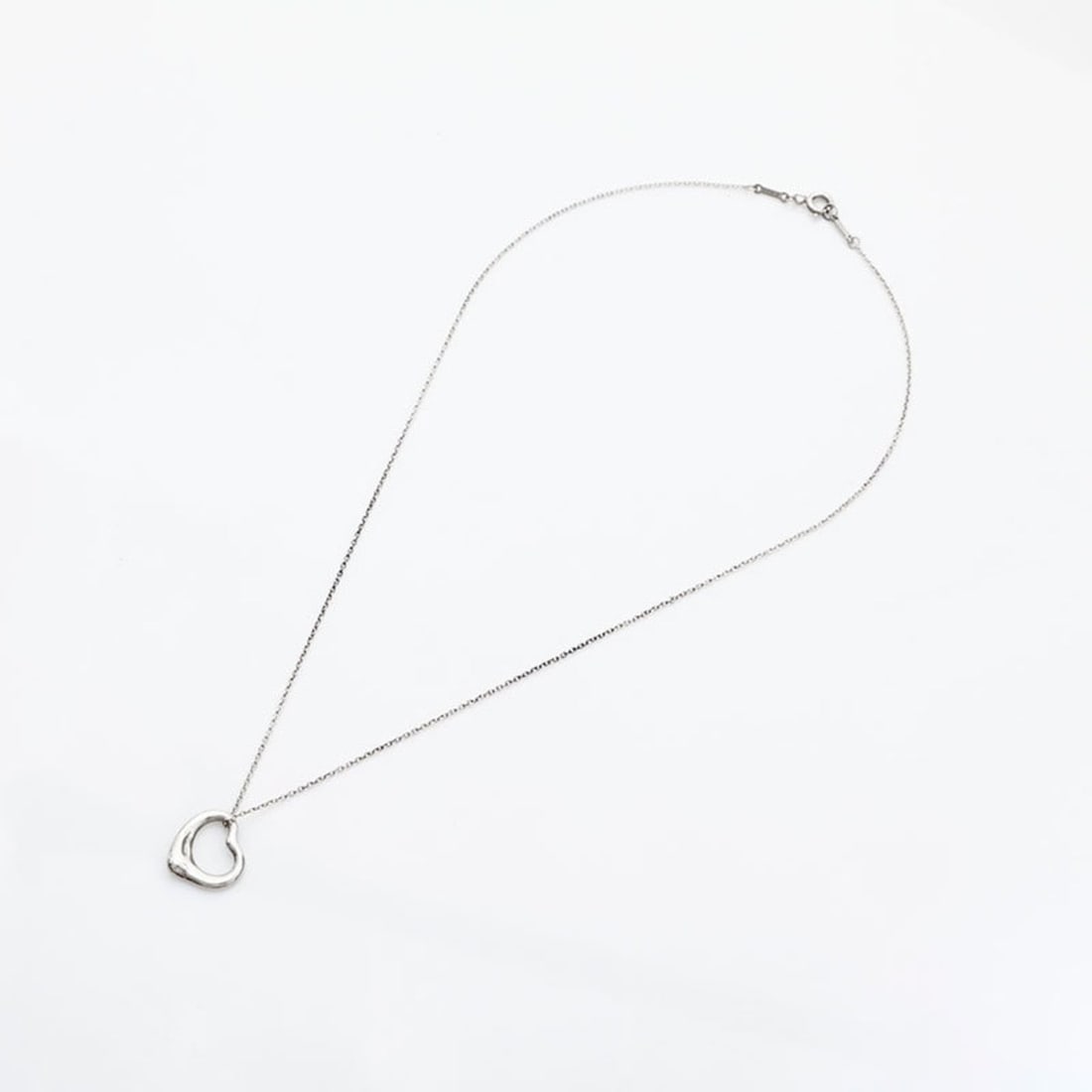 Tiffany & Co. 925 Open Heart Necklace in Silver, WS23099: --- Catalog ---Category: SizePendant Size: 19mm x 13mm / 0.74'' x 0.51''Category: DesignColor: SilverGender: WomenNecklace Type: NecklaceCategory: GeneralBrand: TiffanyCountry of Origin: USA--- Item L