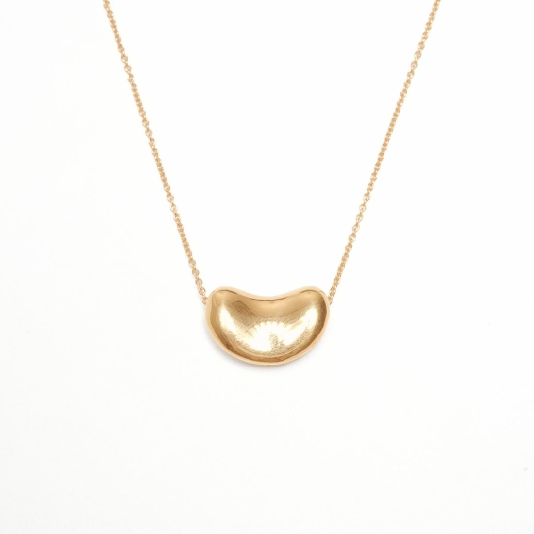 Tiffany & Co. Beans 750 Necklace, Silver, WS24337: --- Catalog ---Category: SizePendant Size: 10mm x 15mm / 0.39'' x 0.59''Neck Circumference: 40 cm / 15.74''Category: DesignColor: SilverGender: WomenNecklace Type: NecklaceCategory: GeneralBrand: Tiff