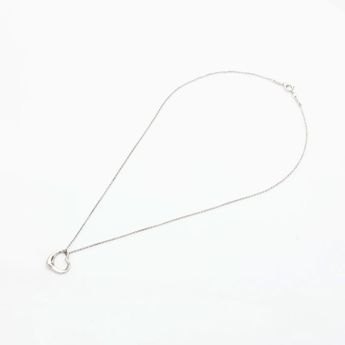 Tiffany & Co. 925 Open Heart Necklace in Silver, WS23093: --- Catalog ---Category: SizePendant Size: 15mm x 13mm / 0.59'' x 0.51''Category: DesignColor: SilverGender: WomenNecklace Type: NecklaceCategory: GeneralBrand: TiffanyCountry of Origin: USA--- Item L