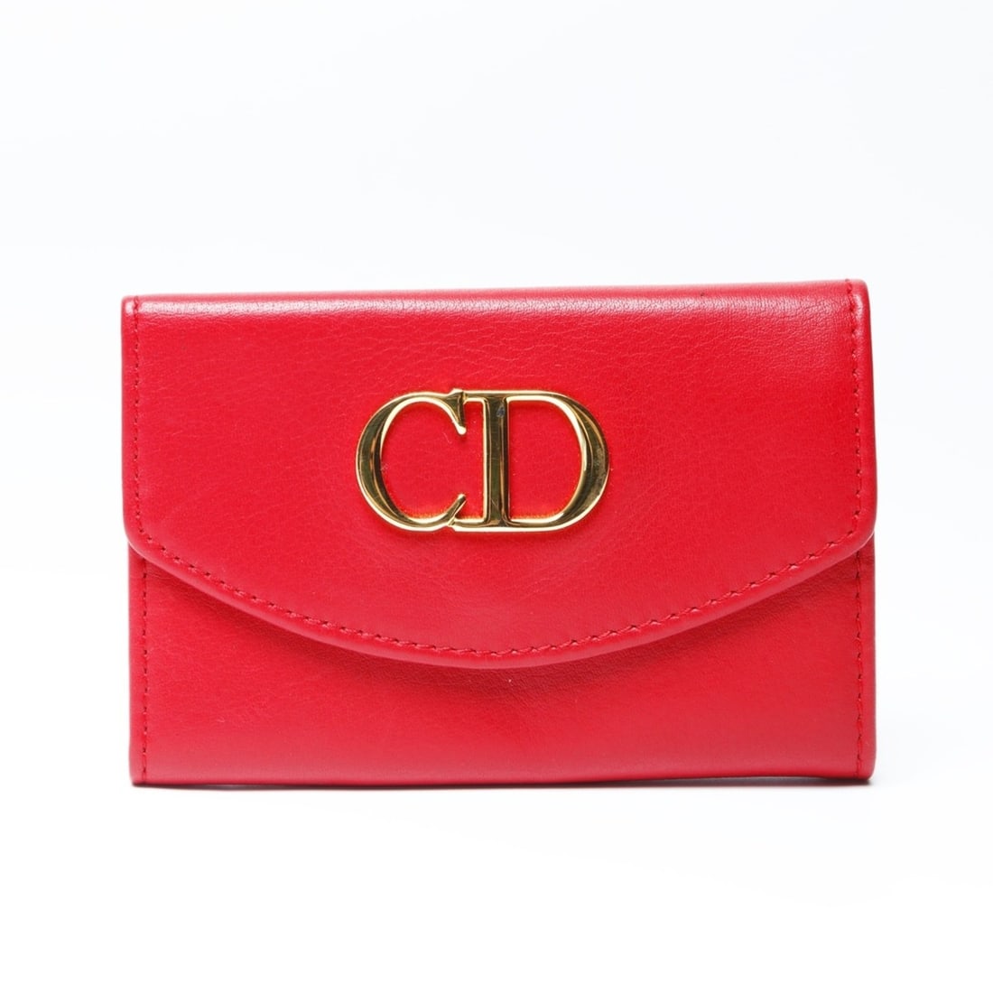 Christian Dior Leather CD Logo Key Case in Red: --- Catalog ---Category: DesignType: KeycaseColor: Red colorGender: WomenCategory: GeneralBrand: Christian DiorCountry of Origin: FranceCategory: Physical PropertiesSize (HxWxD): 6.5cm x 10.5cm x 1.5c