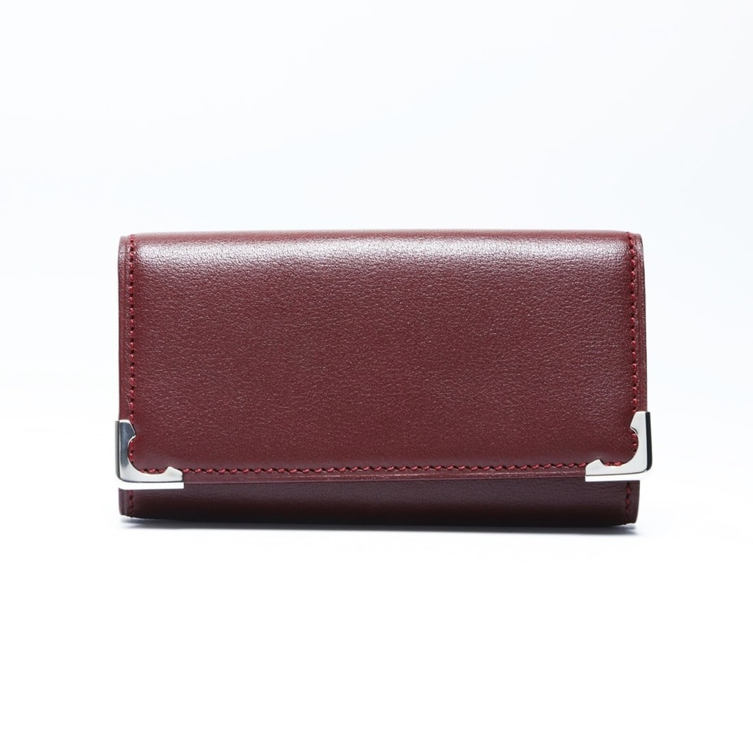 Cartier Must Line Leather Key Case in Red: --- Catalog ---Category: DesignType: KeycaseColor: Red colorGender: WomenCategory: GeneralBrand: CartierCountry of Origin: FranceCategory: Physical PropertiesSize (HxWxD): 9.5cm x 5cm x 2cm / 3.74''