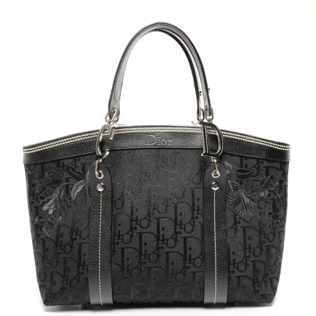 Christian Dior Trotter Canvas Floral Embroidered Cotton Tote Bag in Black: --- Catalog ---Category: SizeSize (HxWxD): 22cm x 32cm x 10cm / 8.66'' x 12.59'' x 3.93''Category: DesignType: Tote bagColor: BlackGender: WomenCategory: GeneralBrand: Christian DiorCountry of Origin: