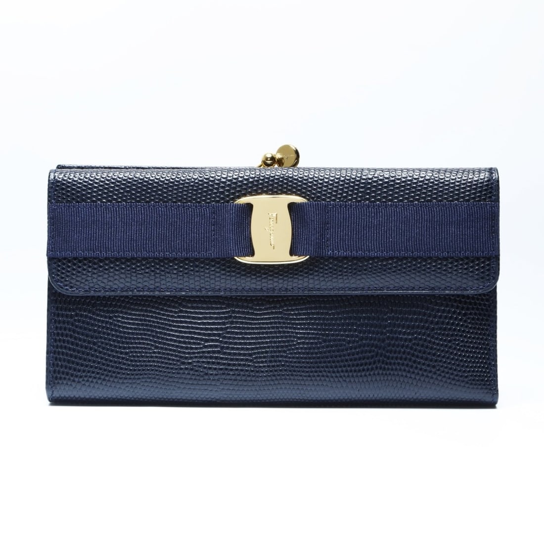 Salvatore Ferragamo Vara Leather Long Wallet in Navy: --- Catalog ---Category: SizeSize (HxWxD): 10cm x 18.5cm x 2.5cm / 3.93'' x 7.28'' x 0.98''Category: DesignType: Long wallet (bi-fold)Color: NavyGender: WomenCategory: GeneralBrand: Salvatore Ferragam