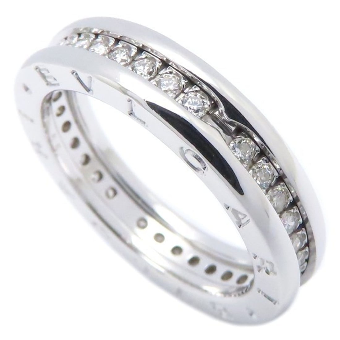BVLGARI B.zero1 Diamond Ring #55 18KWG Women's 295114: --- Catalog ---Category: SizeUS Size: 7.5Brand Size: 55Category: DesignType: Band ringColor: White goldStone: DiamondGender: WomenMaterial: White gold (18K)Category: GeneralBrand: Bvlgari--- Item List