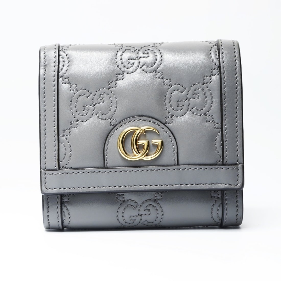 Gucci GG Matelasse Tri-fold Wallet in Gray: --- Catalog ---Category: SizeSize (HxWxD): 11cm x 11cm x 3cm / 4.33'' x 4.33'' x 1.18''Category: DesignType: Wallet (tri-fold)Color: GrayGender: WomenCategory: GeneralBrand: GucciCountry of Origin: