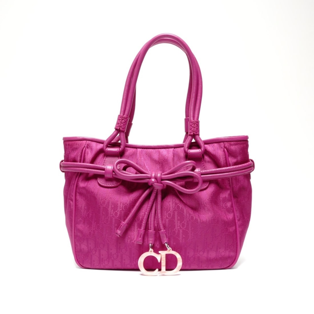 Christian Dior Lovely Canvas Trotter Handbag in Pink: --- Catalog ---Category: SizeSize (HxWxD): 20cm x 29cm x 8cm / 7.87'' x 11.41'' x 3.14''Category: DesignType: HandbagColor: PinkGender: WomenCategory: GeneralBrand: Christian DiorCountry of Origin: Fr