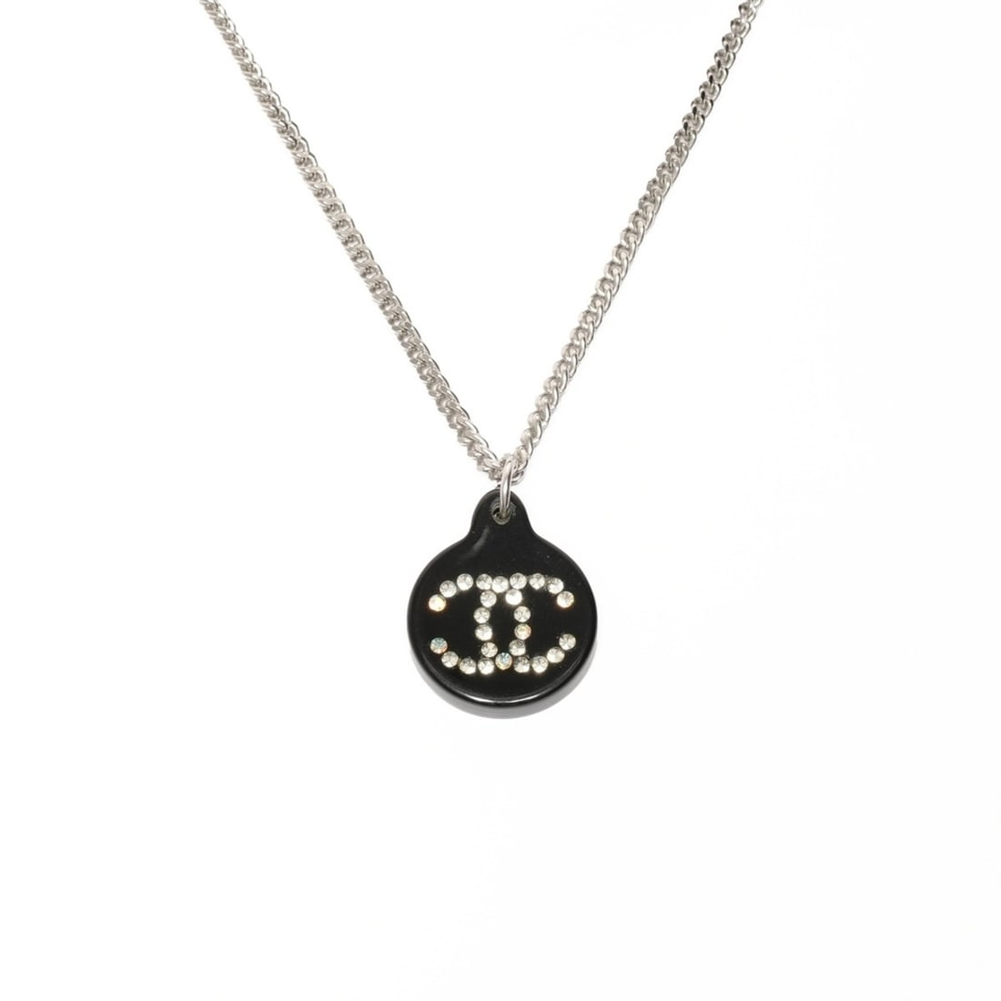 CHANEL 03A 2003 Coco Mark Black Circle Rhinestone Necklace in Silver: --- Catalog ---Category: SizePendant Size: 22mm x 18mm / 0.86'' x 0.7''Neck Circumference: 40 cm / 15.74''Category: DesignColor: SilverStone: RhinestoneGender: WomenNecklace Type: NecklaceCategory: