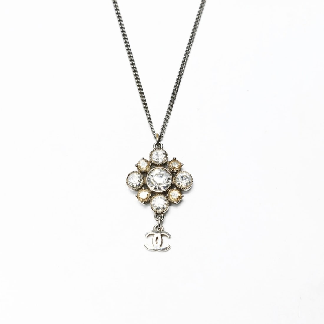 CHANEL 09V 2009 Coco Mark Rhinestone Necklace in Silver: --- Catalog ---Category: SizePendant Size: 40mm x 24mm / 1.57'' x 0.94''Neck Circumference: 51 cm / 20.07''Category: DesignColor: SilverStone: RhinestoneGender: WomenNecklace Type: NecklaceCategory: G