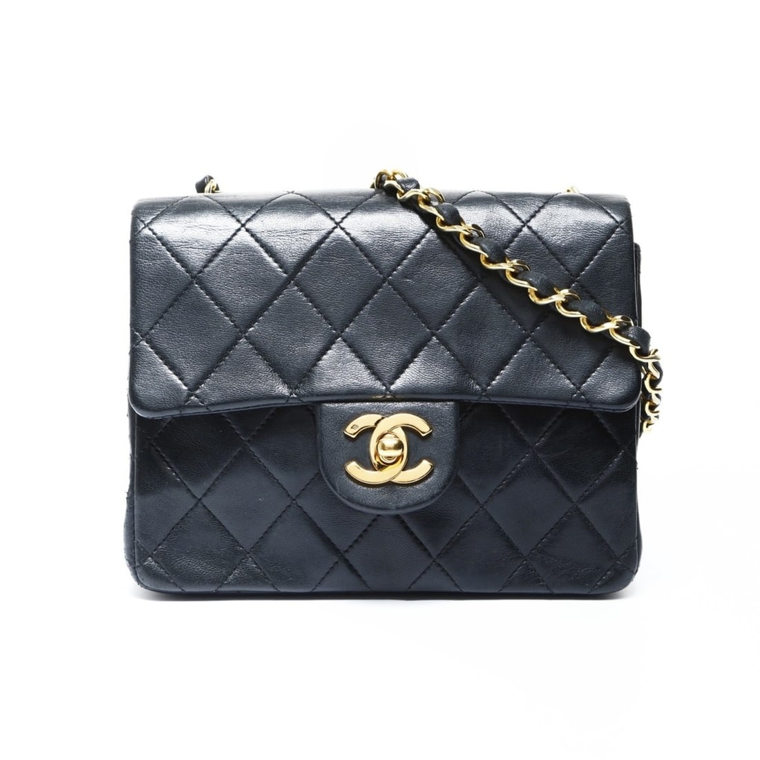 CHANEL No. 1 1989-1991 Mini Matelasse Lambskin Square Shoulder Bag in Black: --- Catalog ---Category: SizeSize (HxWxD): 13.5cm x 17.5cm x 6.5cm / 5.31'' x 6.88'' x 2.55''Strap Length: 105cm / 41.33''Category: DesignType: Shoulder bagColor: BlackGender: WomenMaterial: Leather L