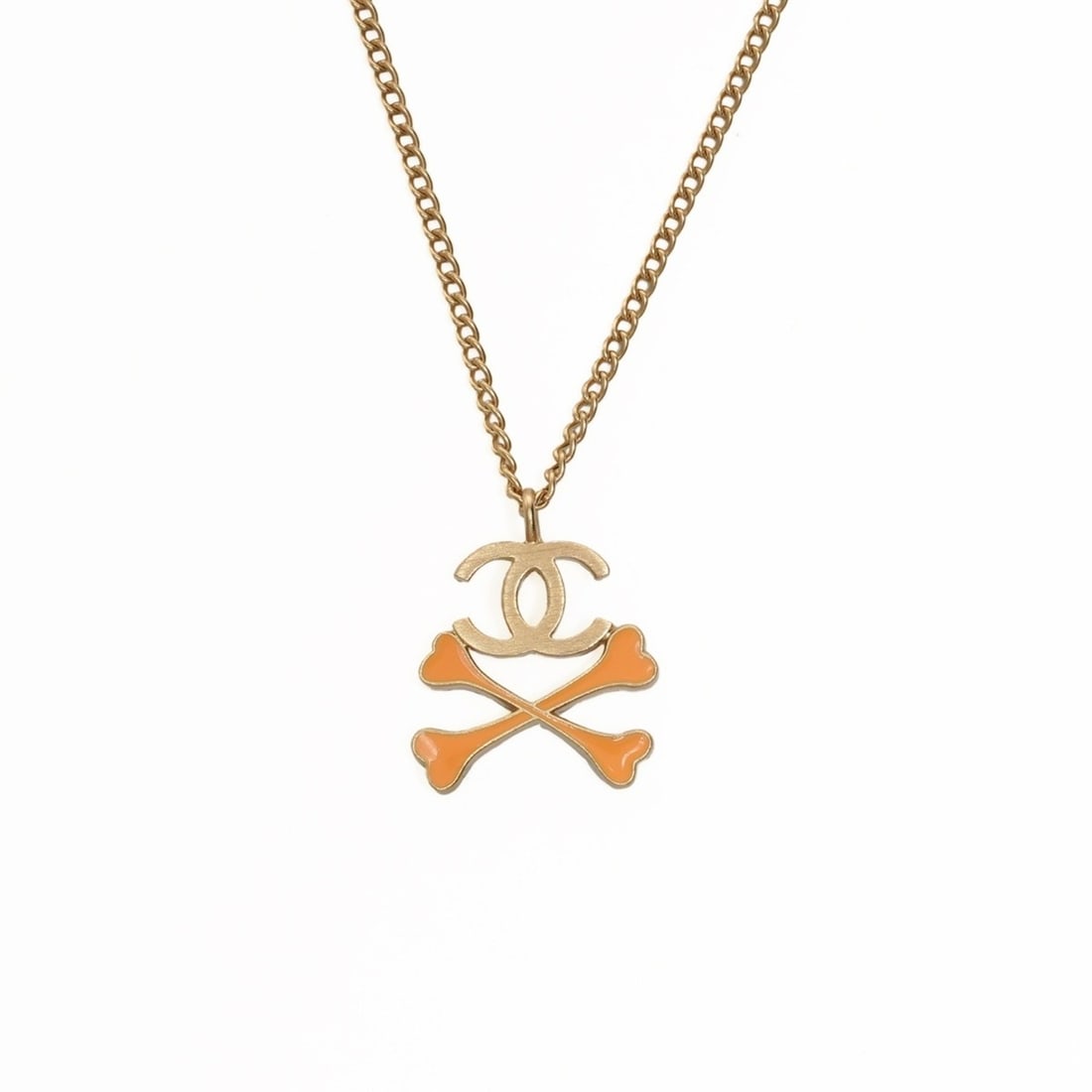 CHANEL 03P 2003 Crossbone Coco Mark Necklace Gold: --- Catalog ---Category: SizePendant Size: 20mm x 20mm / 0.78'' x 0.78''Neck Circumference: 42 cm / 16.53''Category: DesignColor: GoldGender: WomenNecklace Type: NecklaceCategory: GeneralBrand: Chanel