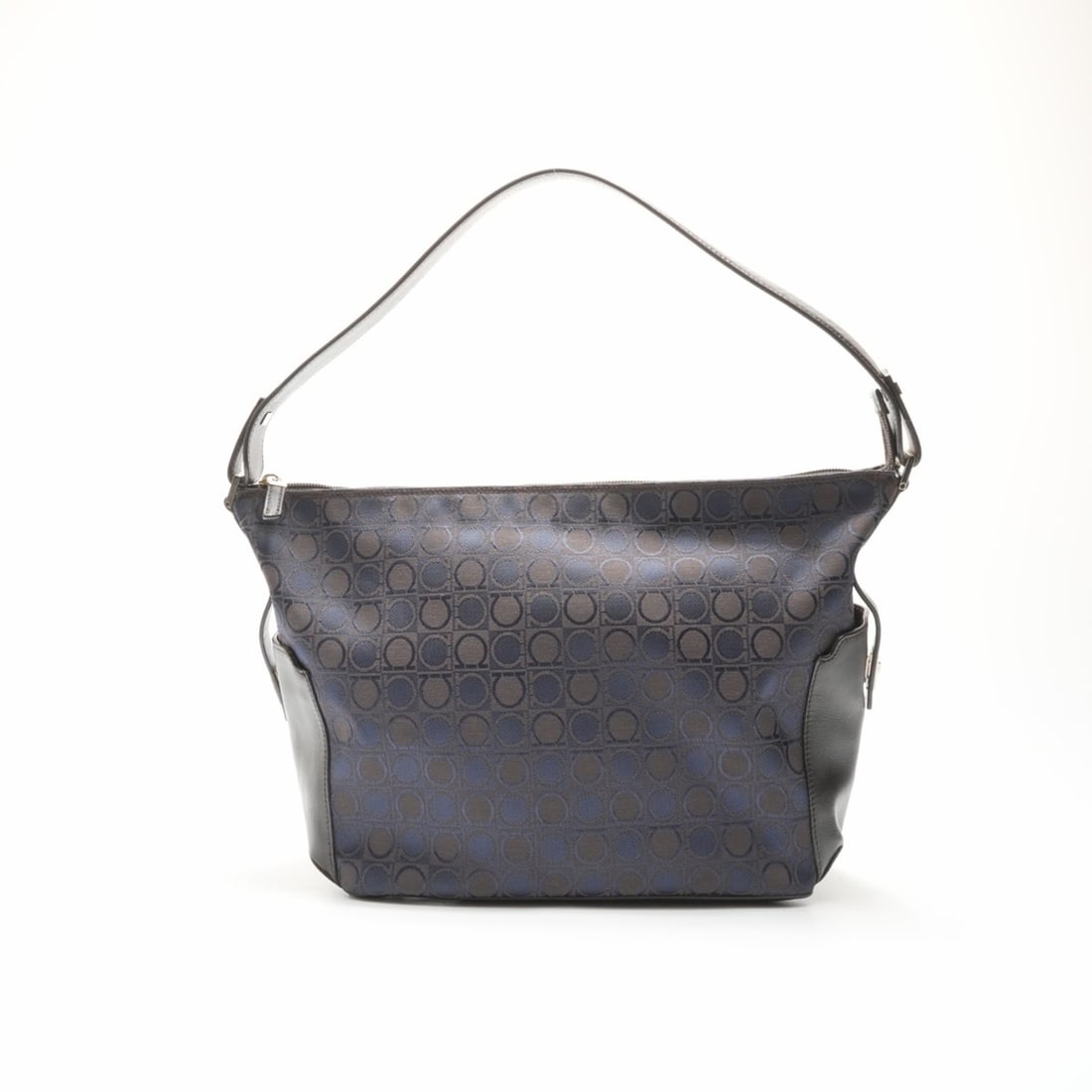 Salvatore Ferragamo Gancini canvas shoulder bag in navy: --- Catalog ---Category: SizeSize (HxWxD): 24cm x 37cm x 16cm / 9.44'' x 14.56'' x 6.29''Strap Length: 54cm / 21.25''Category: DesignType: Shoulder bagColor: NavyGender: WomenMaterial: Canvas Category