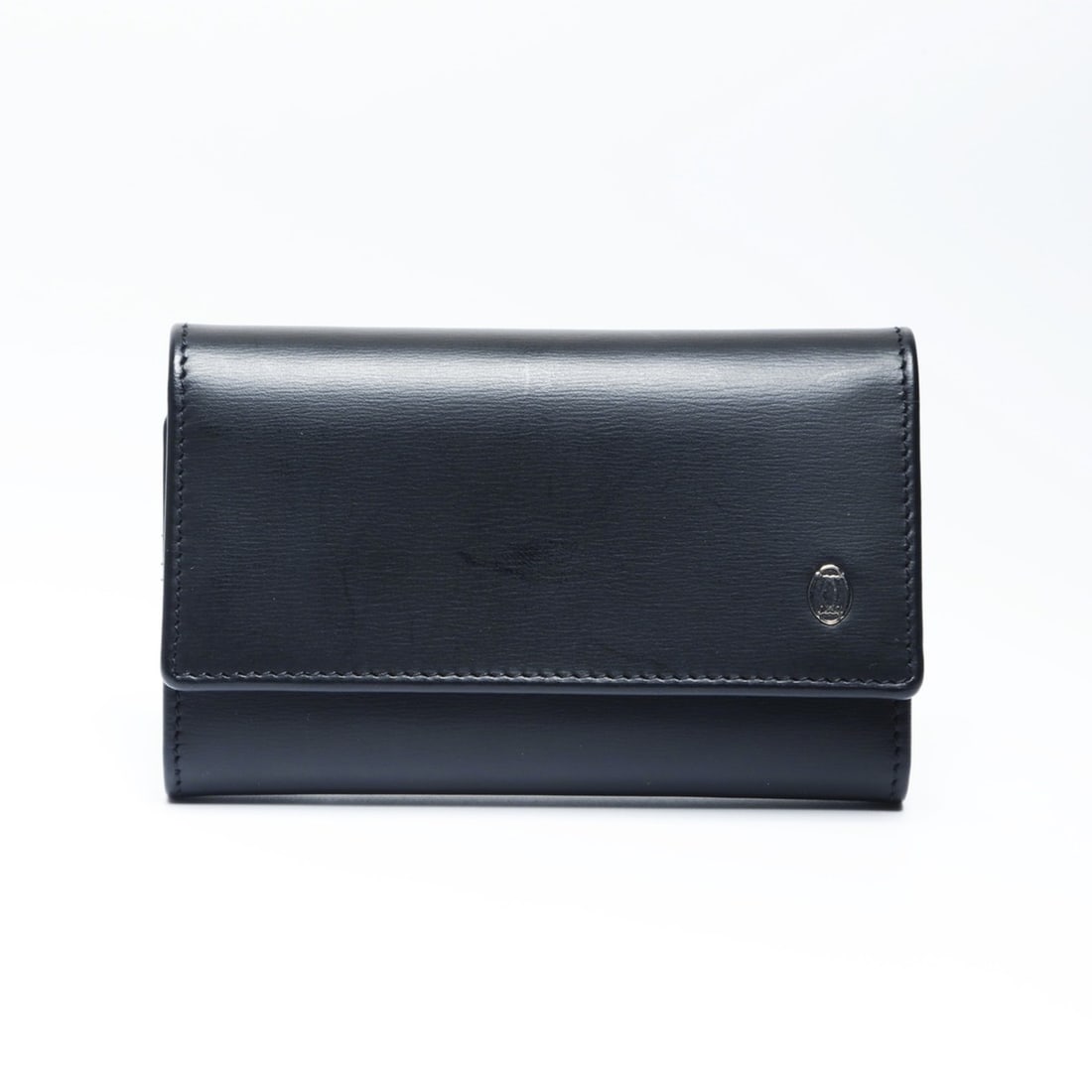 Cartier Leather Key Case, Black: --- Catalog ---Category: DesignType: KeycaseColor: BlackGender: Men,WomenCategory: GeneralBrand: CartierCountry of Origin: FranceCategory: Physical PropertiesSize (HxWxD): 6.5cm x 10.5cm x 2cm / 2.55'