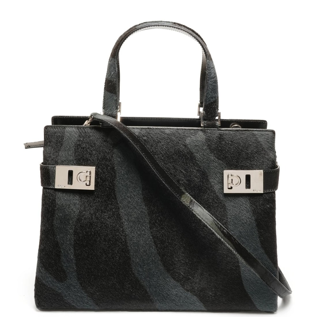 Salvatore Ferragamo Zebra Print Gancini Handbag in Black (WS26431): --- Catalog ---Category: SizeSize (HxWxD): 25cm x 33cm x 13cm / 9.84'' x 12.99'' x 5.11''Strap Length: 93cm / 36.61''Category: DesignType: HandbagColor: BlackGender: WomenMaterial: Leather Leather/Fur