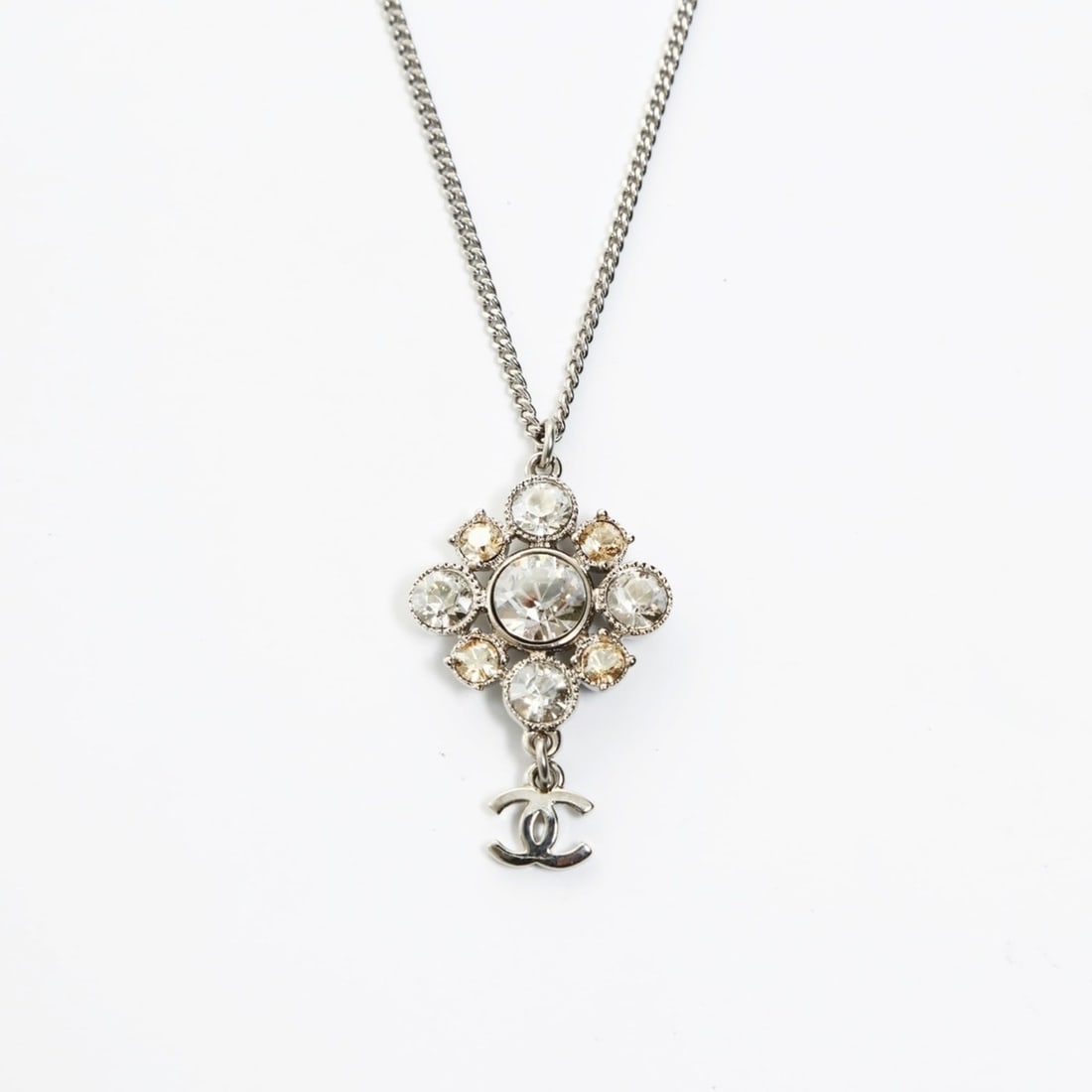 CHANEL 10V 2010 Coco Mark Rhinestone Necklace in Silver (WS26558): --- Catalog ---Category: SizePendant Size: 35mm x 22mm / 1.37'' x 0.86''Neck Circumference: 48 cm / 18.89''Category: DesignColor: SilverStone: RhinestoneGender: WomenNecklace Type: NecklaceCategory: G