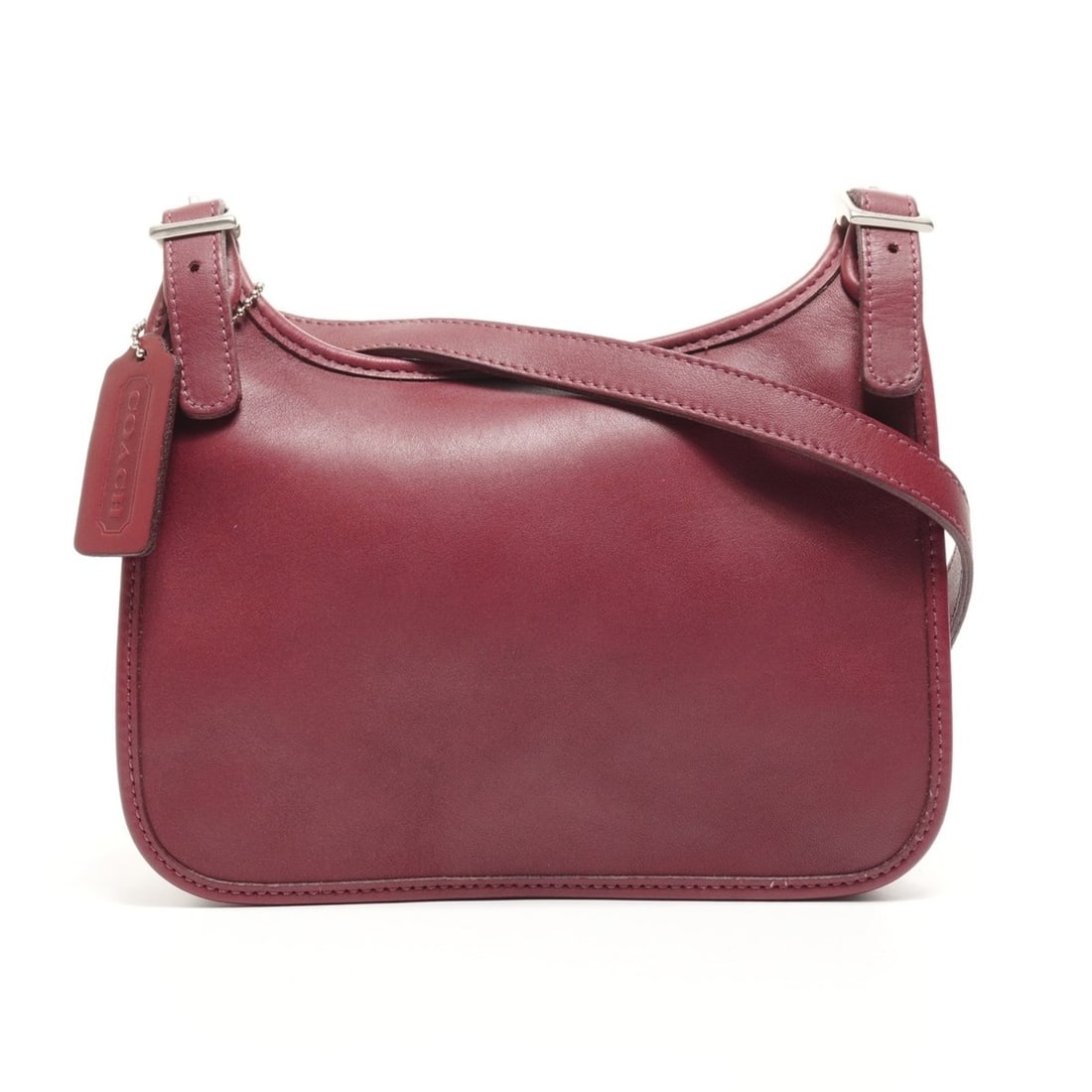 Coach leather shoulder bag in red: --- Catalog ---Category: SizeSize (HxWxD): 18cm x 21cm x 4cm / 7.08'' x 8.26'' x 1.57''Strap Length: 117cm / 46.06''Category: DesignType: Shoulder bagColor: Red colorGender: WomenMaterial: Leather Cat