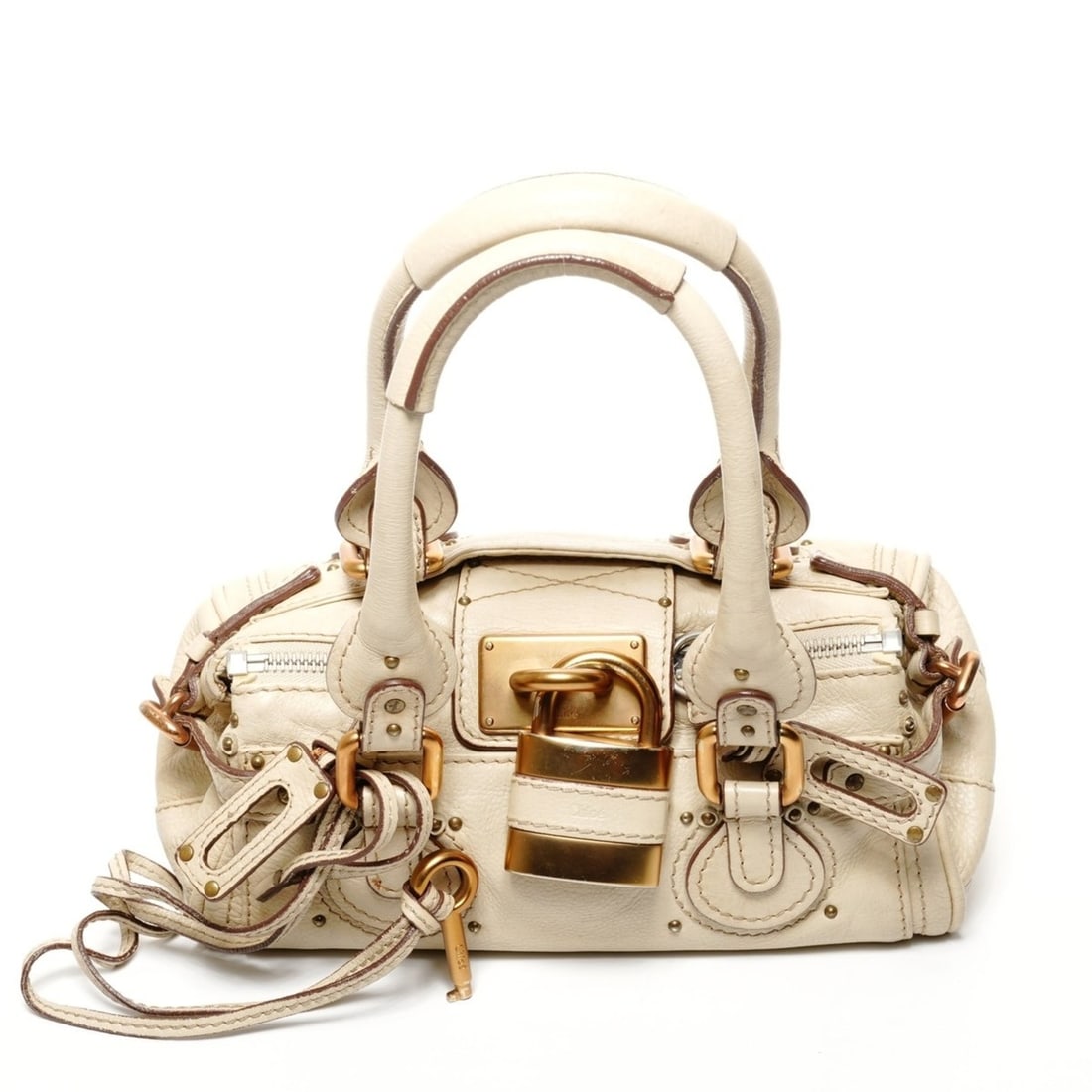 Chloé Chloe Paddington small leather handbag in beige: --- Catalog ---Category: SizeHandle Drop: 20.00cm / 7.87''Size (HxWxD): 12cm x 29cm x 17cm / 4.72'' x 11.41'' x 6.69''Category: DesignType: HandbagColor: BeigeGender: WomenMaterial: Leather Category: