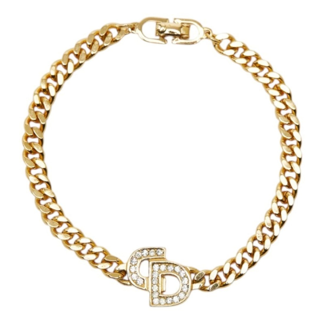 Christian Dior Dior CD logo chain bracelet in gold with plated rhinestones for women.: --- Catalog ---Category: SizeLength: 17cm / 6.69''Category: DesignType: Charm braceletColor: GoldGender: WomenMaterial: RhinestoneCategory: GeneralBrand: Christian Dior--- Item List ---Section: Condit