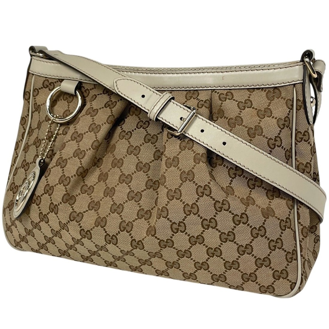 Gucci GG pattern shoulder bag with logo, made of canvas in beige and white, model number 296834, for: --- Catalog ---Category: SizeSize (HxWxD): 26cm x 34cm x 10cm / 10.23'' x 13.38'' x 3.93''Category: DesignType: Shoulder bagColor: Beige, WhiteGender: WomenMaterial: GG canvas , Leather Category: Gene