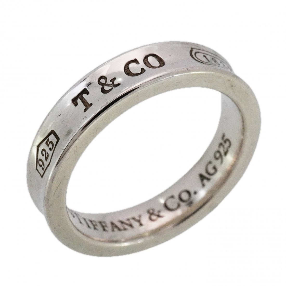 Tiffany narrow ring, silver 925, size 6, for women: --- Catalog ---Category: SizeJP Size: 6US Size: 3.5Category: DesignType: Band ringGender: WomenMaterial: Silver 925Category: GeneralBrand: Tiffany--- Item List ---Section: ConditionRanking: Rank AB Us