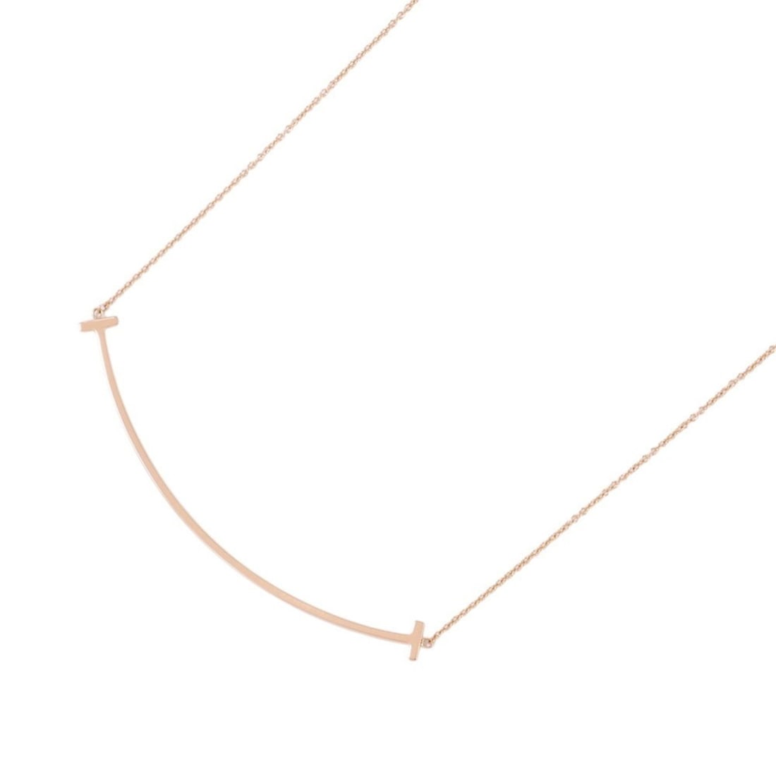 Tiffany & Co. T Smile Pendant, Large, 18K Pink Gold, 60011651. Necklace.: --- Catalog ---Category: SizePendant Size: 5.7mm x 68.7mm / 0.22'' x 2.7''Neck Circumference: 46.5 cm / 18.3''Category: DesignColor: Pink goldGender: WomenMaterial: Pink gold (18K)Pendant Type: Pendan