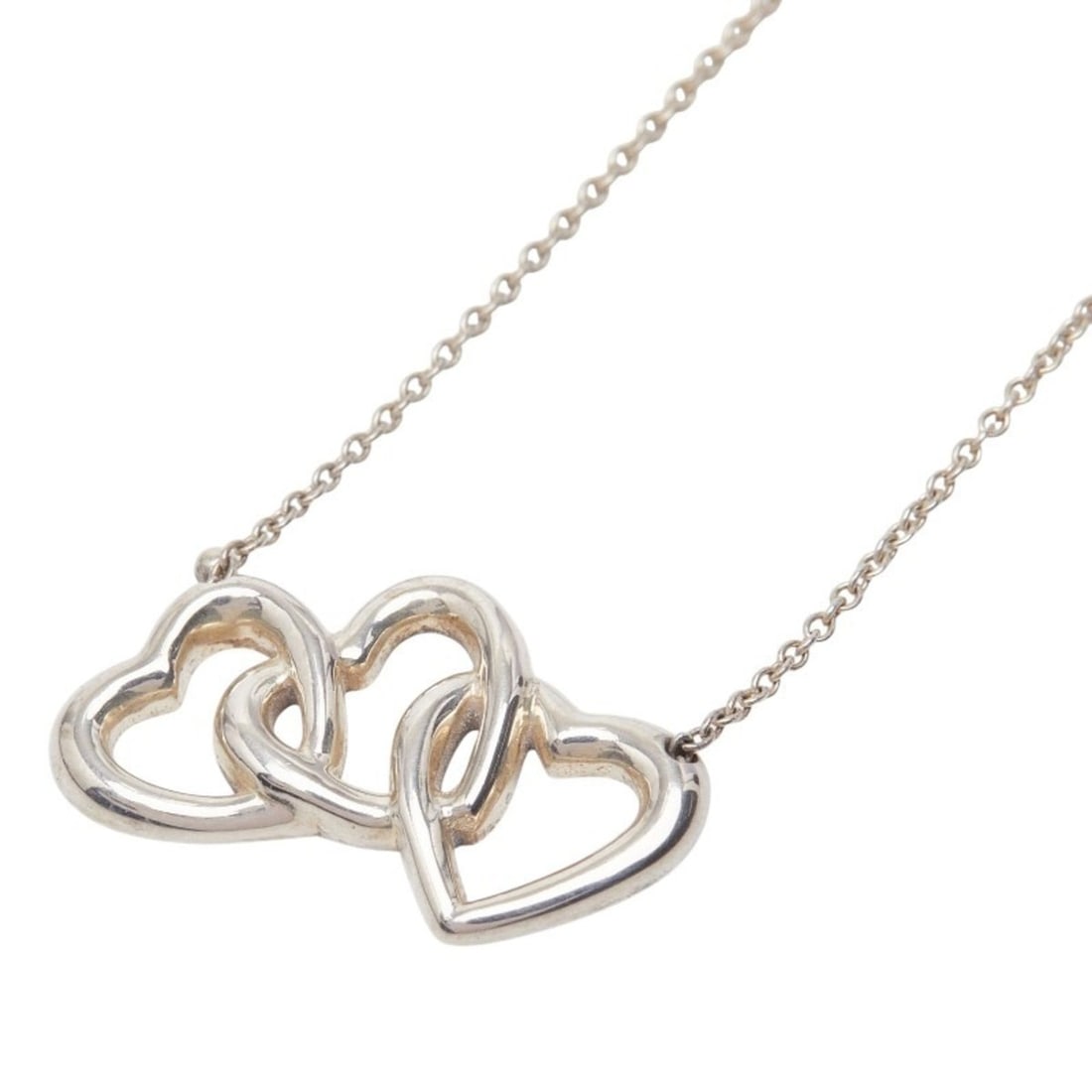 Tiffany & Co. Triple Heart Necklace in 925 Sterling Silver for Women: --- Catalog ---Category: SizeWeight: 4g / 0.14oz.Pendant Size: 13.3mm x 23.2mm / 0.52'' x 0.91''Neck Circumference: 40 cm / 15.74''Category: DesignMetal: SilverGender: WomenMetal Purity: Silver925Neck