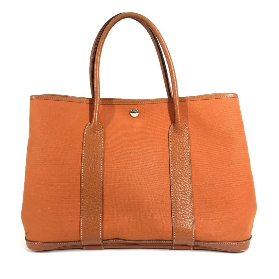 HERMES Garden Party 36 PM, a handbag, shoulder bag, or tote bag in Negonda canvas, available orange: --- Catalog ---Category: SizeSize (HxWxD): 26cm x 35.5cm x 17cm / 10.23'' x 13.97'' x 6.69''Category: DesignType: Handbag, Shoulder bag, Tote bagColor: OrangeGender: Men,WomenMaterial: Negonda leather