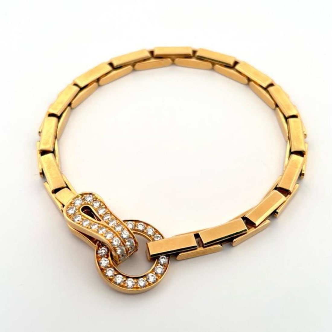 CARTIER K18YG Agraffe Diamond Bracelet Cartier: --- Catalog ---Category: SizeLength: 19cm / 7.48''Category: DesignType: Charm braceletColor: Yellow goldGender: WomenMaterial: Yellow gold (18K)Category: GeneralBrand: Cartier--- Item List