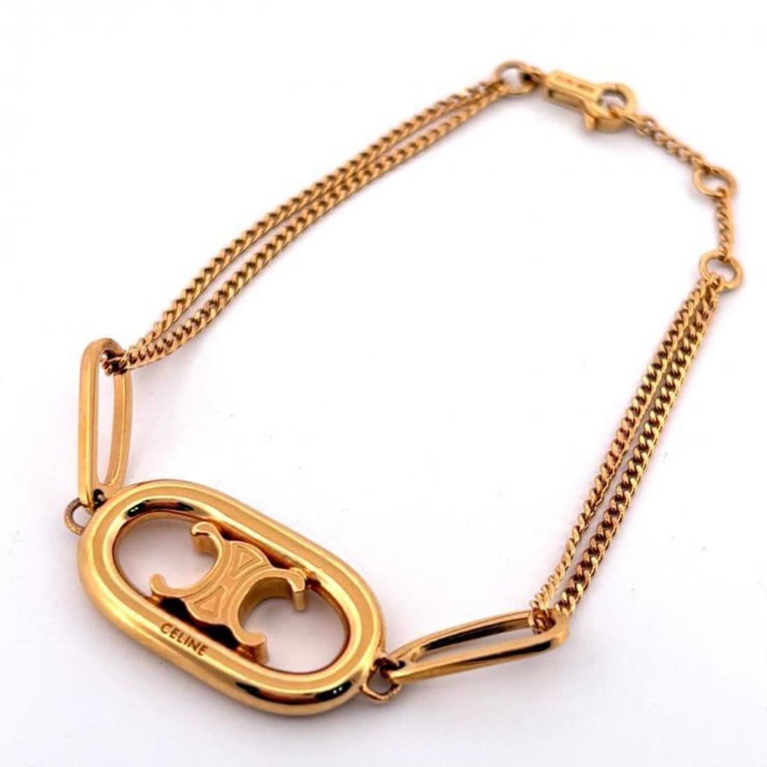 Celine Maillon Triomphe bracelet in GP gold plated: --- Catalog ---Category: SizeLength: 16.5cm / 6.49''Category: DesignType: Charm braceletColor: GoldGender: WomenMaterial: Gold platingCategory: GeneralBrand: Celine--- Item List ---Section: