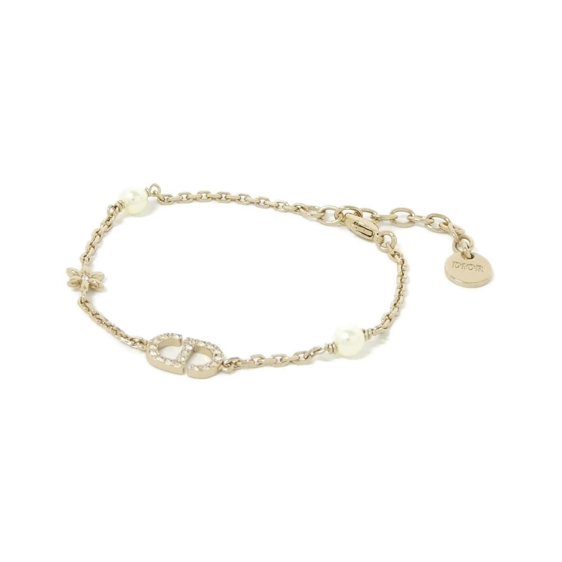 Christian Dior PETIT CD DAISY B3141WOMCY Bracelet: --- Catalog ---Category: SizeLength: 15cm - 18cm / 5.9'' - 7.08''Category: DesignType: Charm braceletColor: Clear, Gold, WhiteGender: Men,WomenCategory: GeneralBrand: Christian Dior--- Item List ---Se
