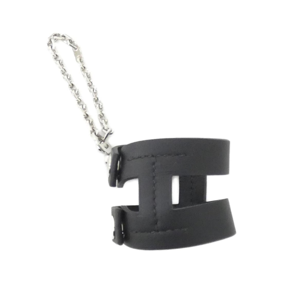 Hermes Koala 251006G Glove Holder: --- Catalog ---Category: DesignType: Glove holderColor: Black, SilverGender: Men,WomenMaterial: Swift leatherCategory: GeneralMPN: 251006GBrand: Hermes--- Item List ---Section: ConditionRanking: Rank