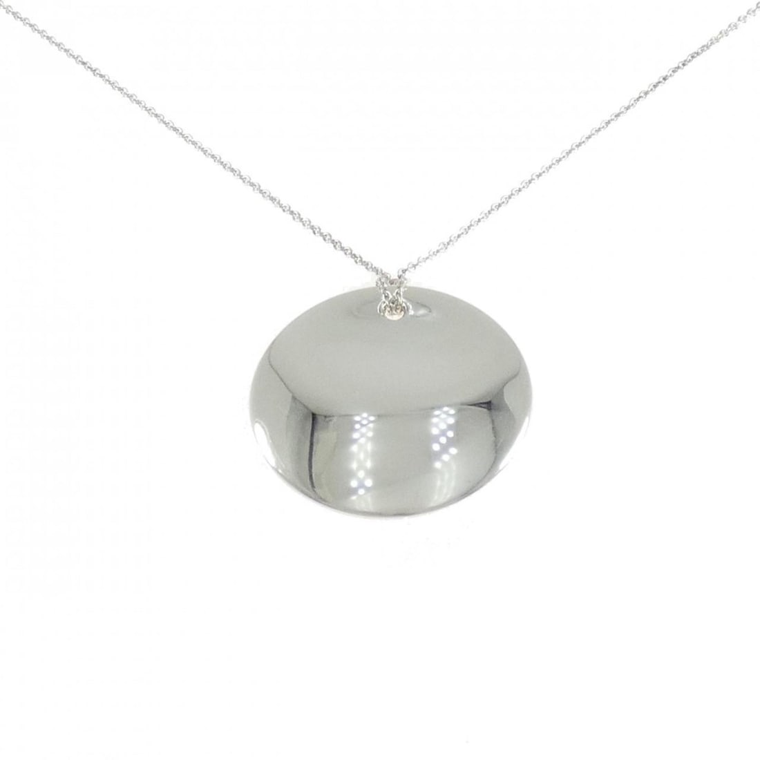 Tiffany Round Necklace: --- Catalog ---Category: SizePendant Size: 34.8mm x 35.2mm / 1.37'' x 1.38''Neck Circumference: 68 cm / 26.77''Category: DesignColor: SilverGender: Women,MenMaterial: Silver 925Pendant Type:
