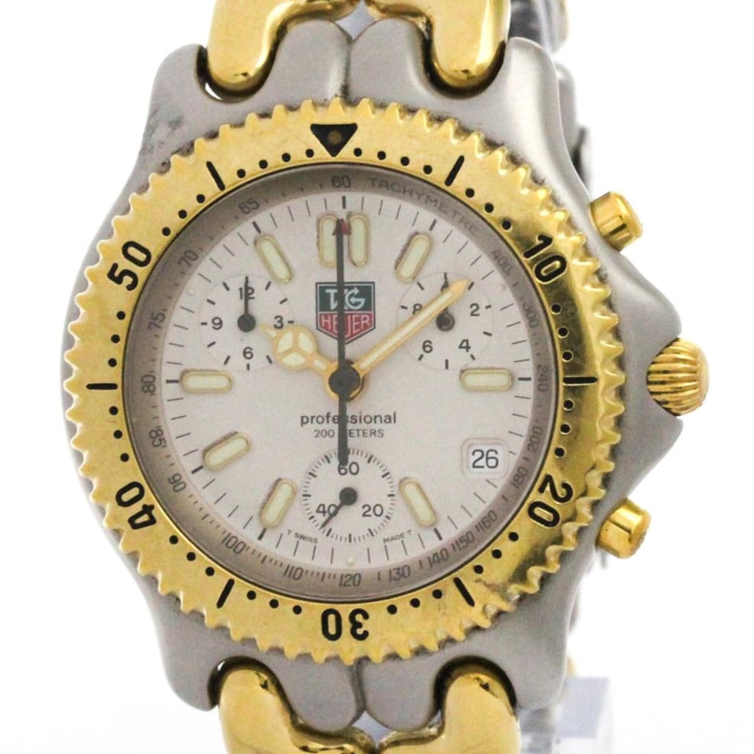 TAG HEUER Sel Chronograph Gold Plated Steel Mens Watch S35.006 Polished: --- Catalog ---Category: SizeCase Diameter: 38mm / 1.5''Category: DesignType: WristwatchStyle: SportGender: MenColor (Dial): WhiteMaterial (Band): Gold plated, Stainless steelMaterial (Case): Gold