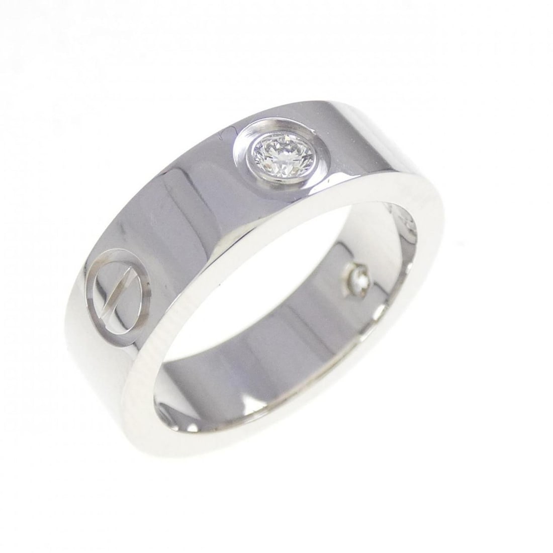 Cartier Love Half-Diamond Ring: --- Catalog ---Category: SizeWidth: 5.2mm / 0.2''Weight: 7.9g / 0.27oz.JP Size: 8US Size: 4.5Category: DesignType: Band ringStone: DiamondGender: WomenMaterial: White gold (18K)Category: GeneralLine:
