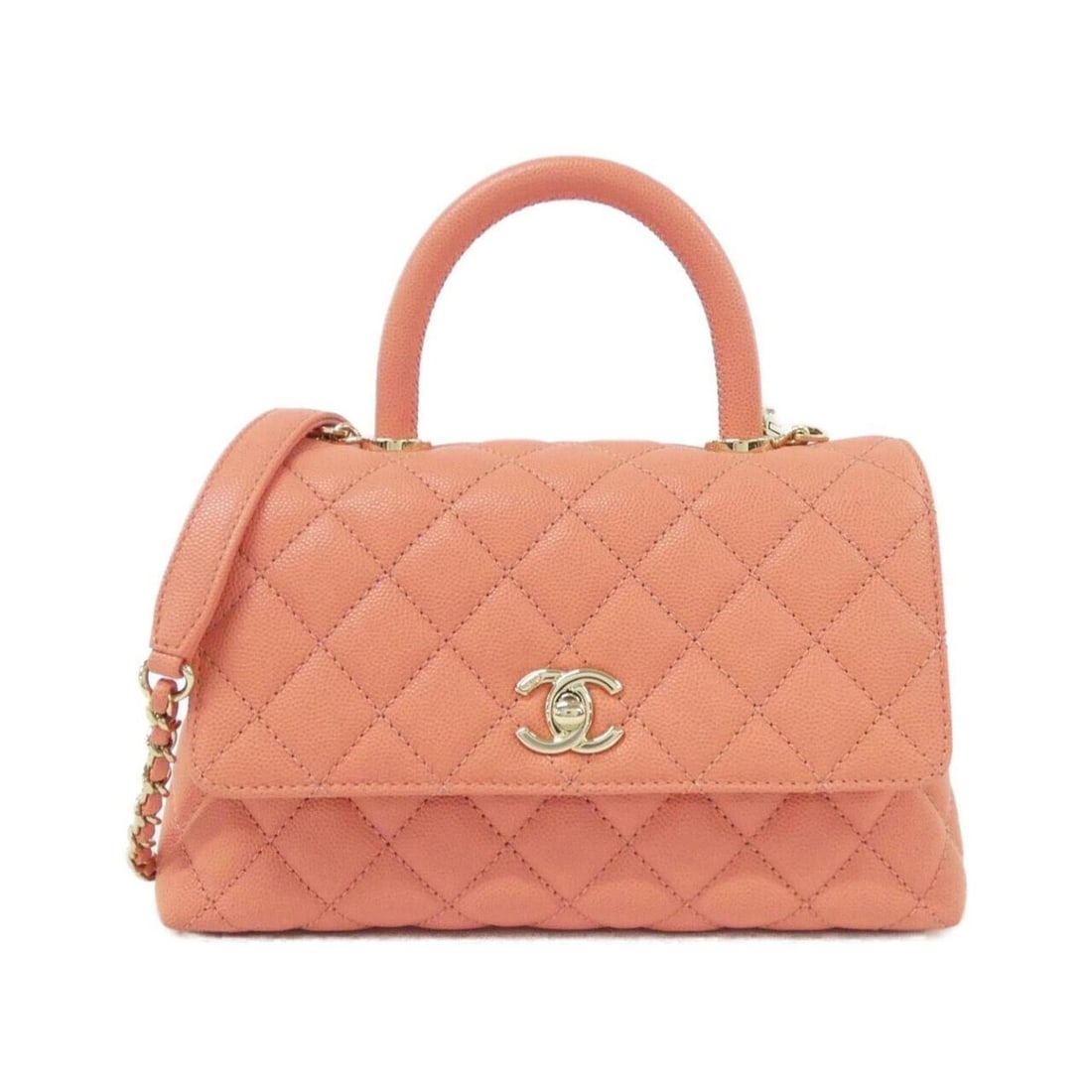 Chanel 92990 handbag: --- Catalog ---Category: SizeSize (HxWxD): 14cm x 22cm x 9cm / 5.51'' x 8.66'' x 3.54''Category: DesignType: HandbagColor: Pink orangeGender: WomenMaterial: Grained Calfskin Category: GeneralMPN:
